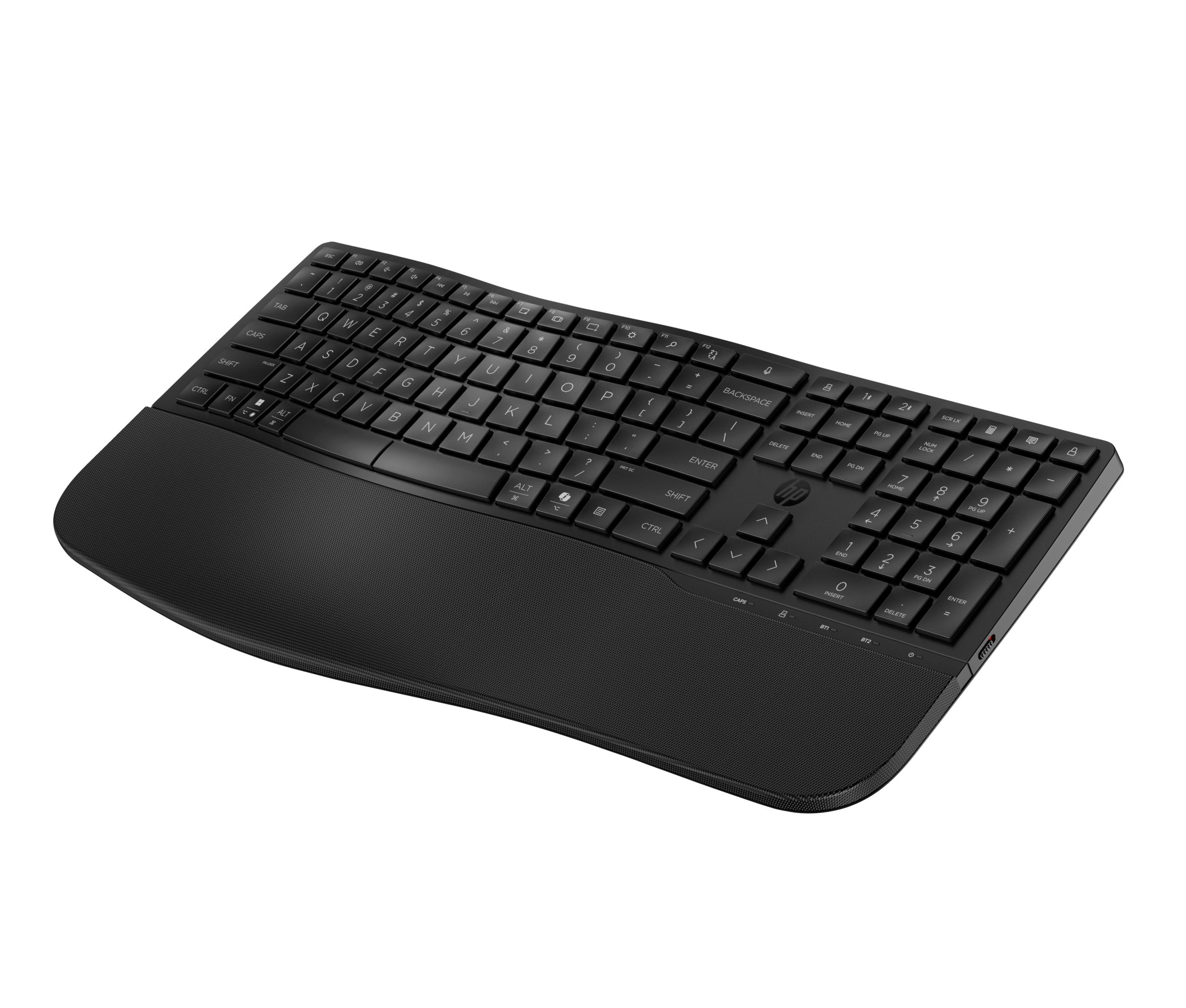 Schwarze Tastatur mit integrierter Handballenauflage und Nummernblock.