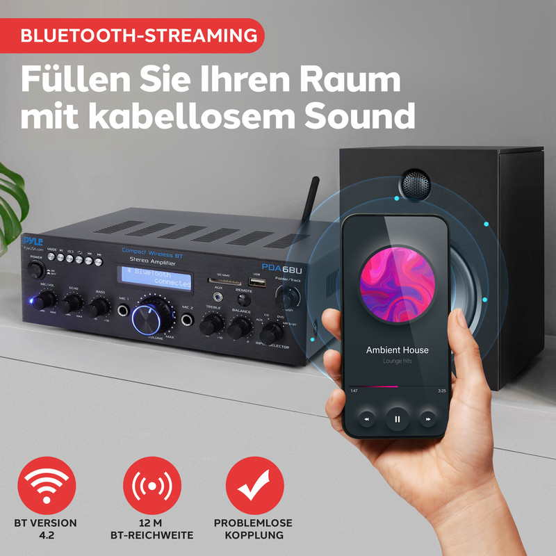 Ein Stereo-Verstärker mit Smartphone, das Musik abspielt. Bluetooth-Streaming.