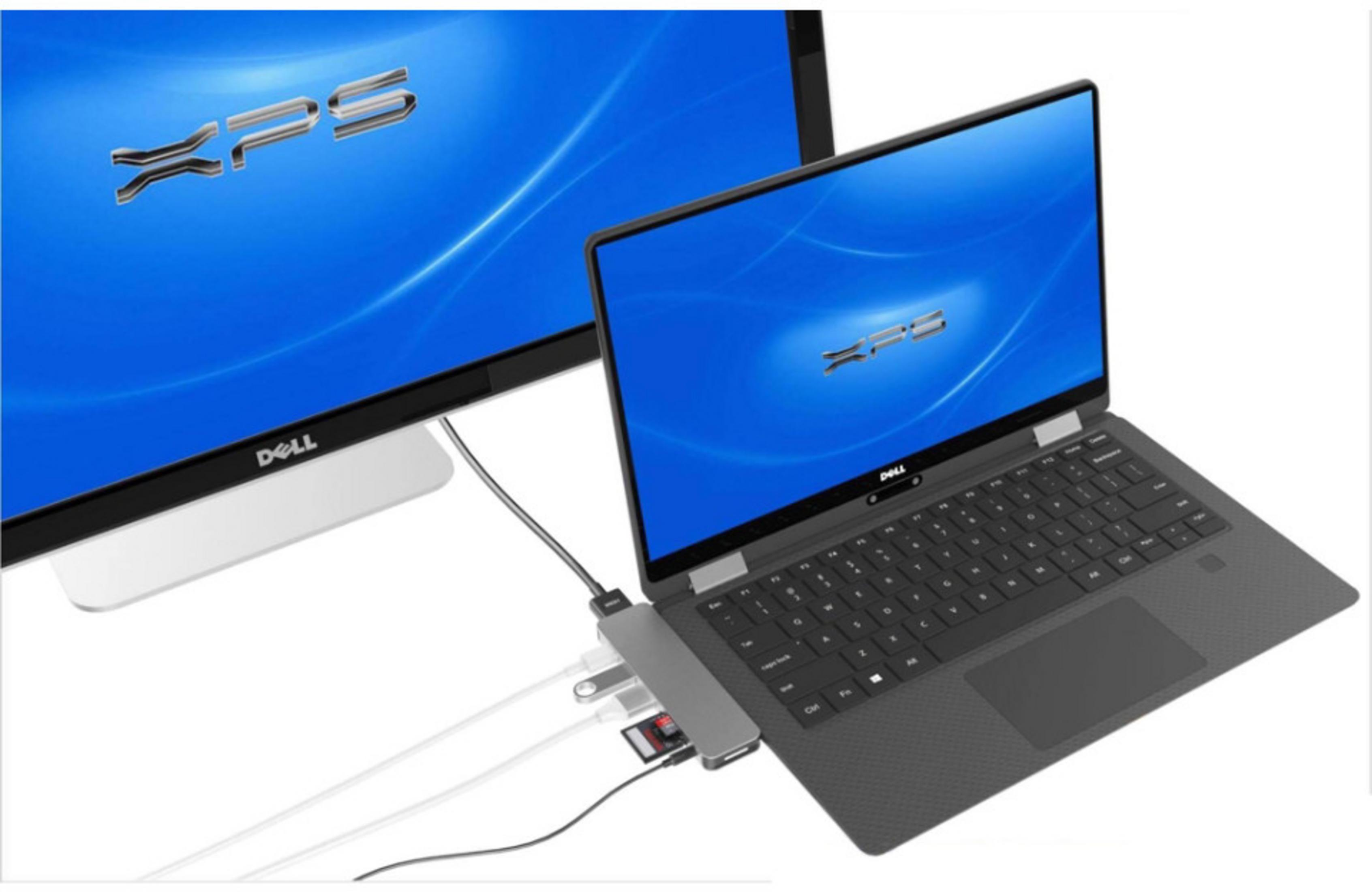 Un laptop e un monitor Dell XPS collegati tramite un hub.