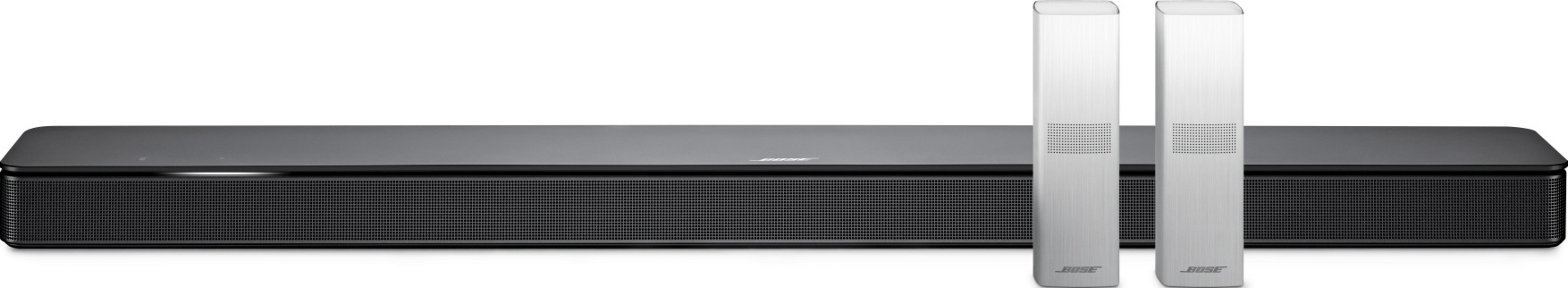 Schwarzer Soundbar mit zwei weißen Lautsprechern daneben.