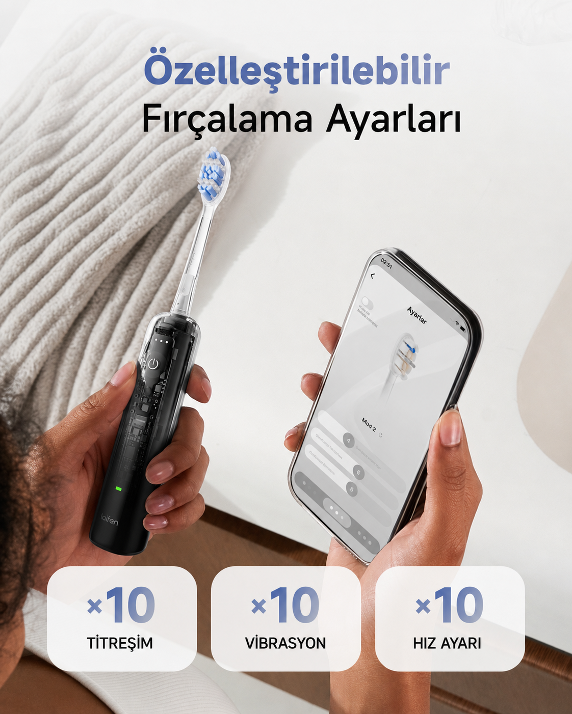 Bir kişi, fırçalama ayarlarını gösteren bir uygulama içeren siyah elektrikli diş fırçası ve akıllı telefon tutuyor.