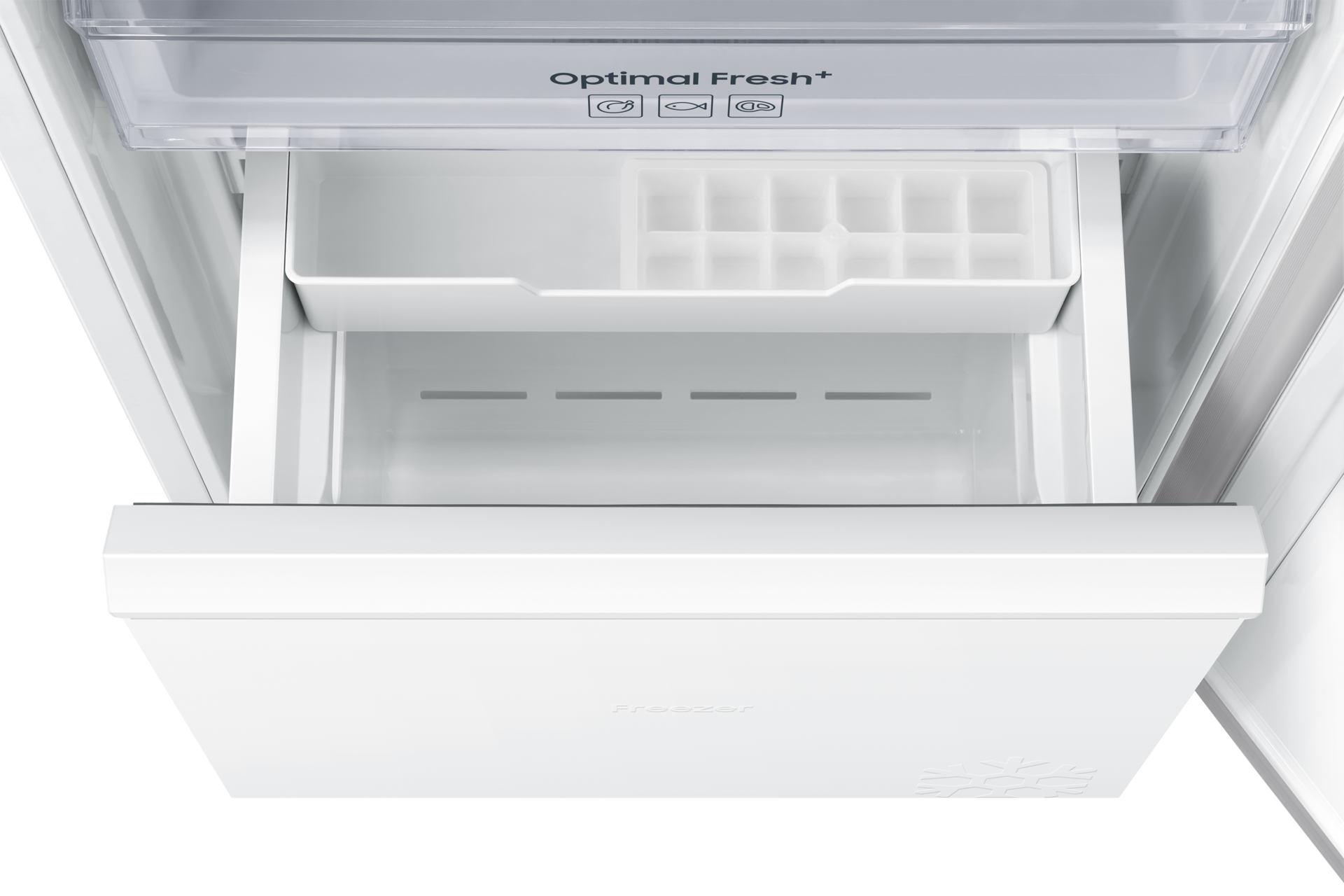 Innenansicht eines Kühlschranks mit Gefrierfach, Eiswürfelbehälter und Schublade.