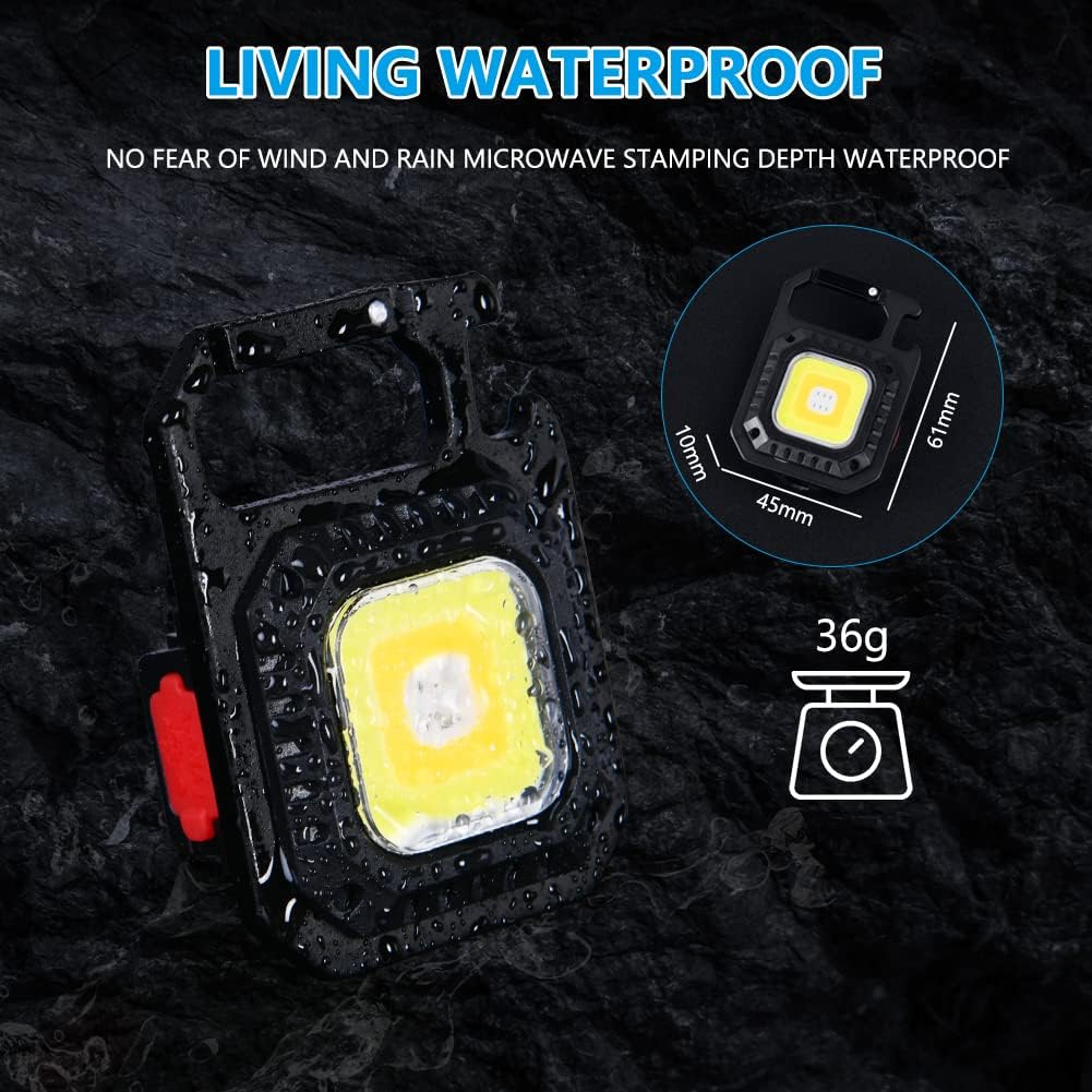 Ein schwarzer, wasserdichter Schlüsselanhänger mit COB-LED-Licht und roten Akzenten.