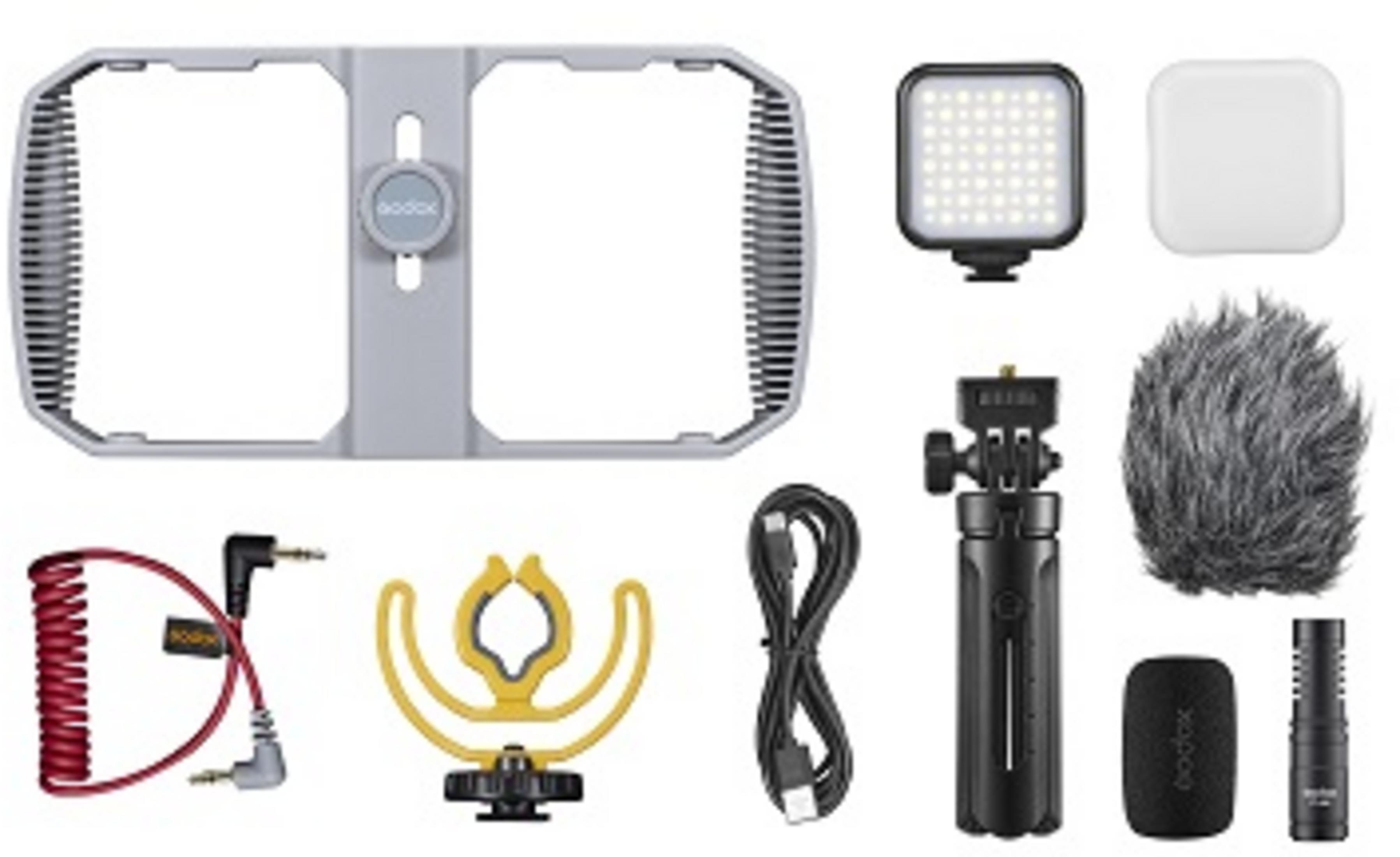 Cage de caméra, lumière LED, microphone, bonnette, câbles et trépied.