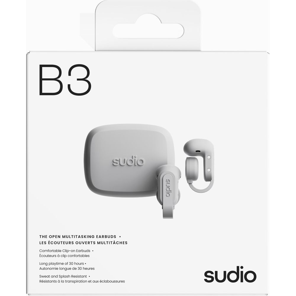 Emballage blanc montrant les écouteurs Sudio B3 et l'étui de chargement.
