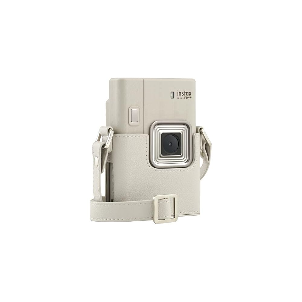 Eine beige Instax Mini 9+ Kamera mit Schutzhülle und Tragegurt.