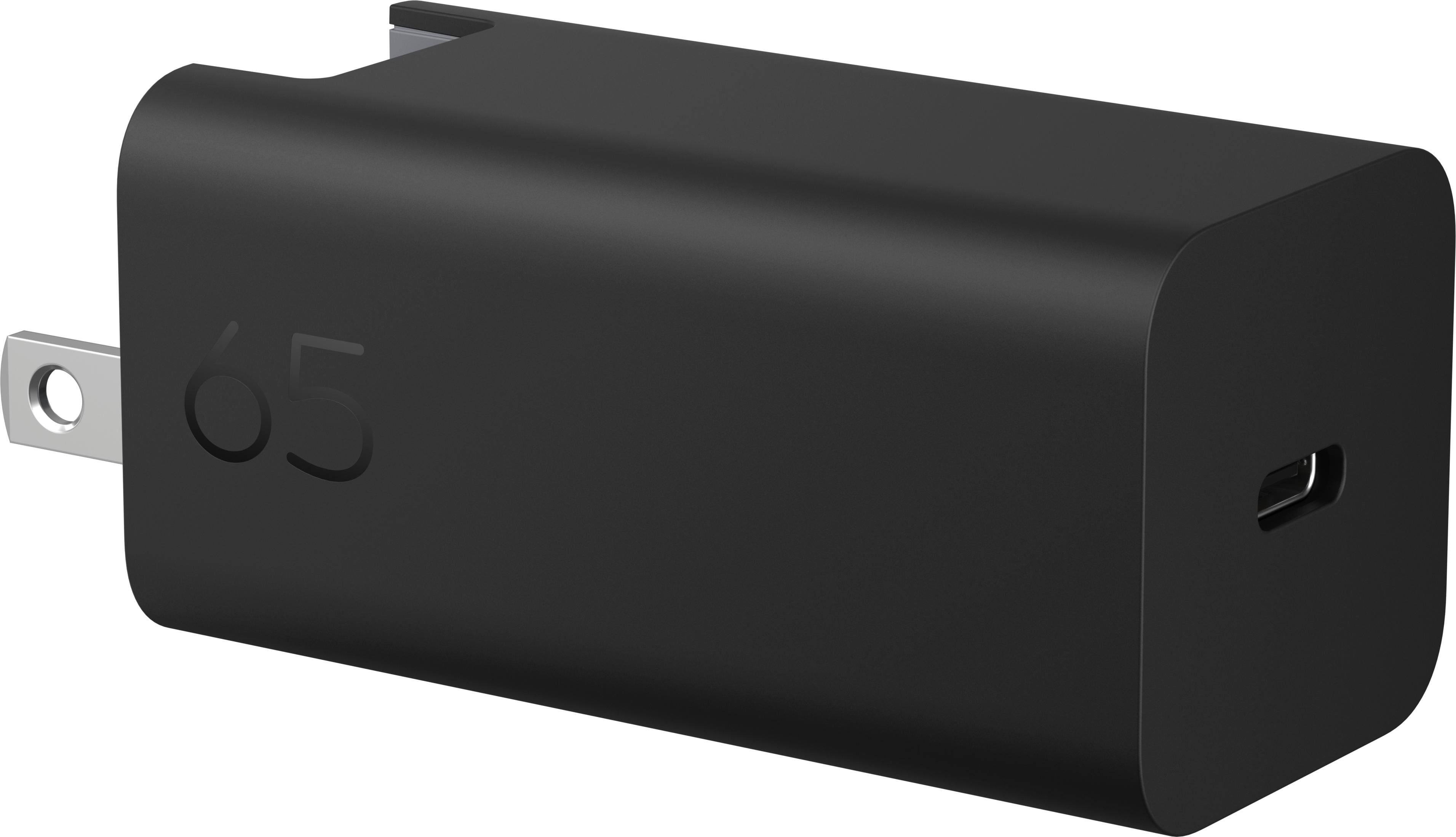 Ein schwarzes Netzteil mit der Aufschrift 65 und einem USB-C-Anschluss.