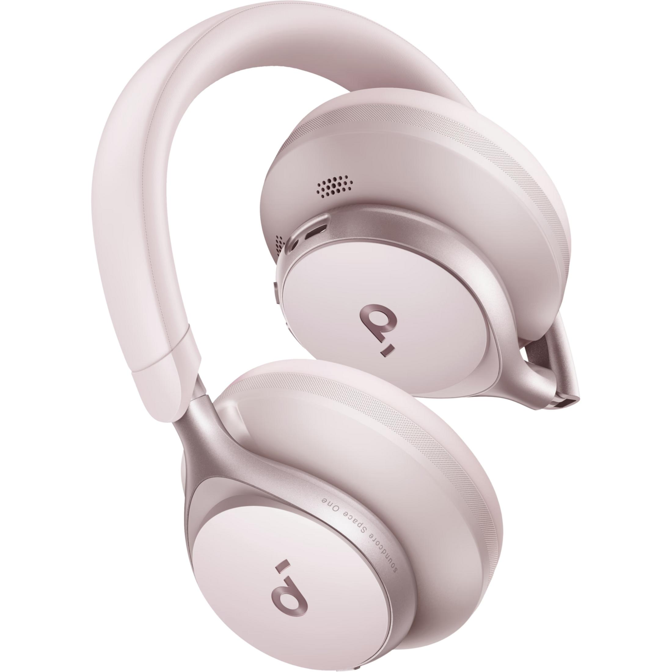 Unos auriculares rosas con detalles plateados, logo y almohadillas.