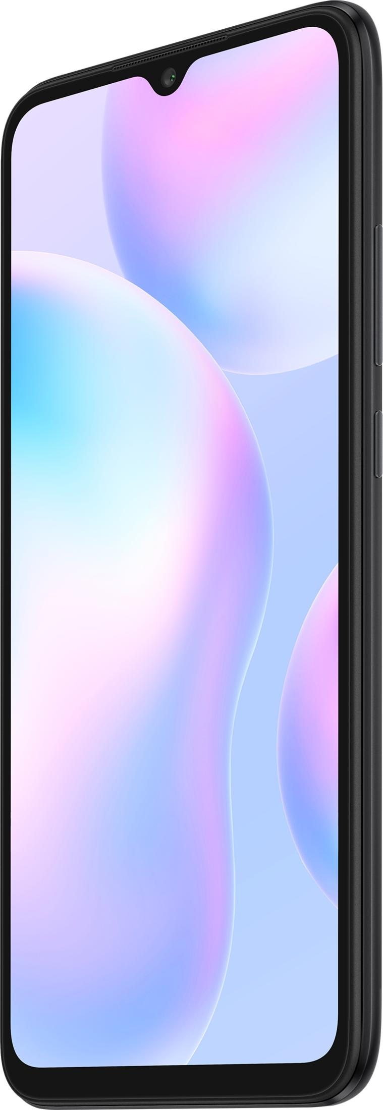 Ein schwarzes Smartphone mit tropfenförmiger Notch und bunten Blasen auf dem Display.