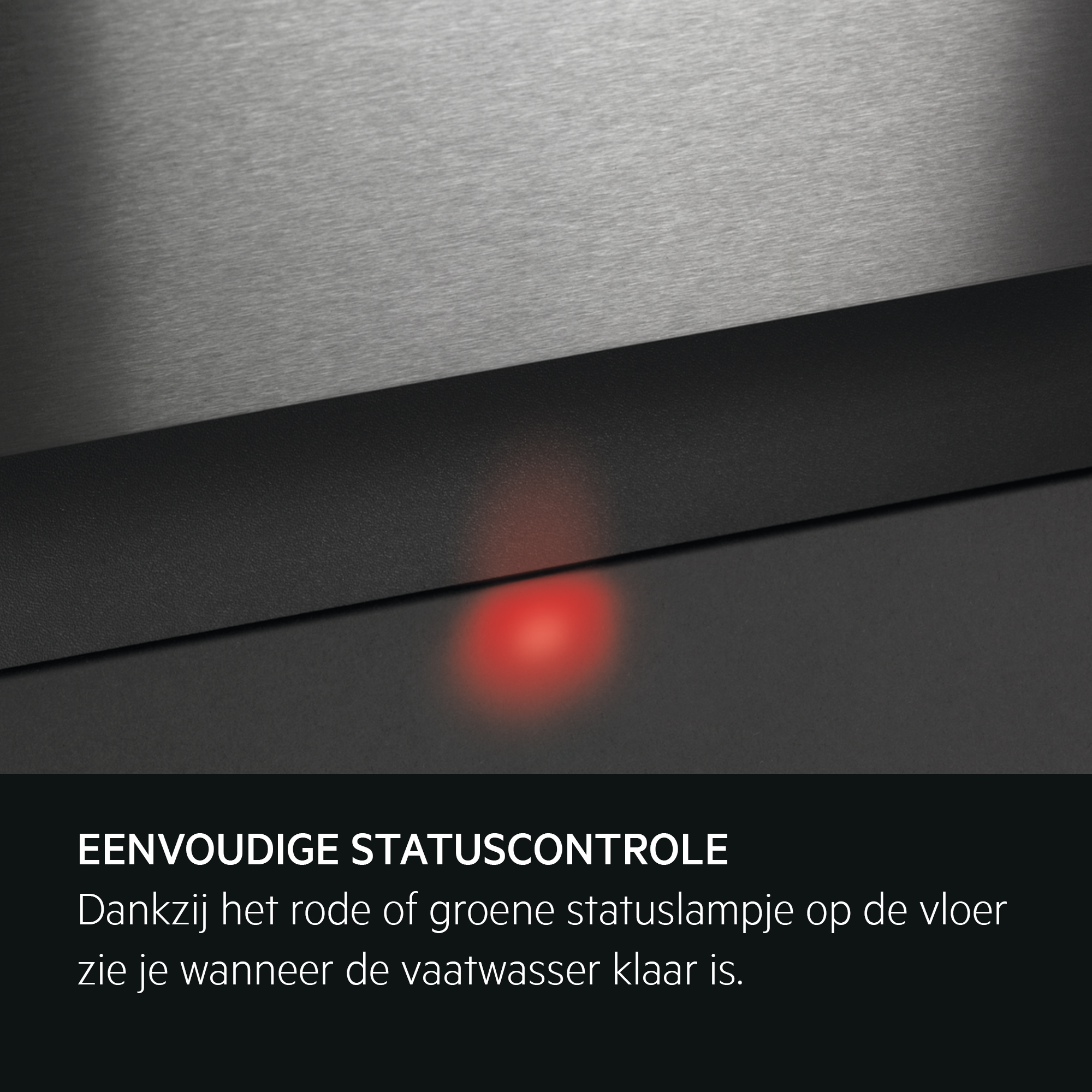 Ein rotes Licht leuchtet auf einem dunklen, texturierten Hintergrund.