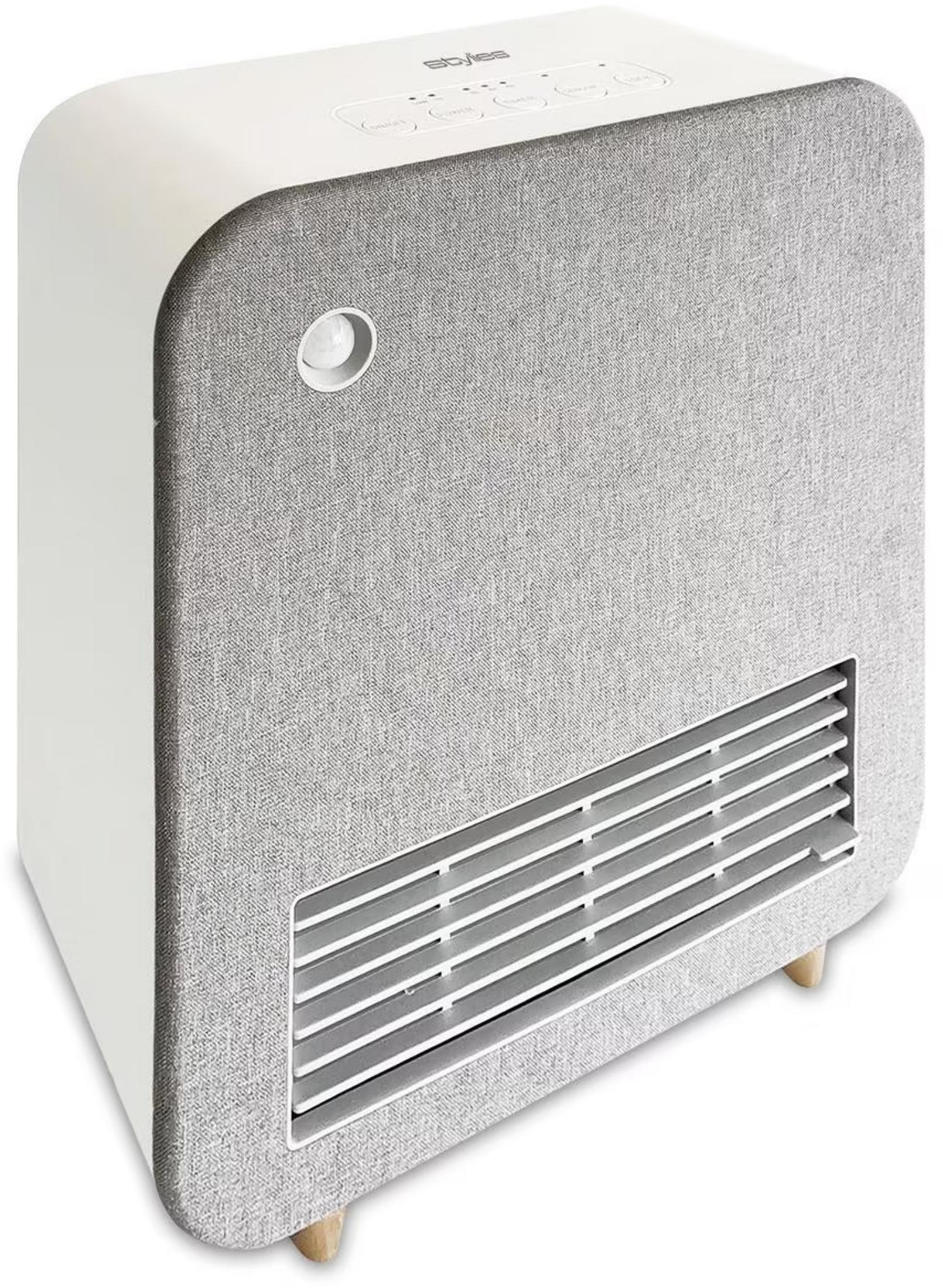 Un purificatore d'aria bianco e grigio con prese d'aria e gambe in legno.