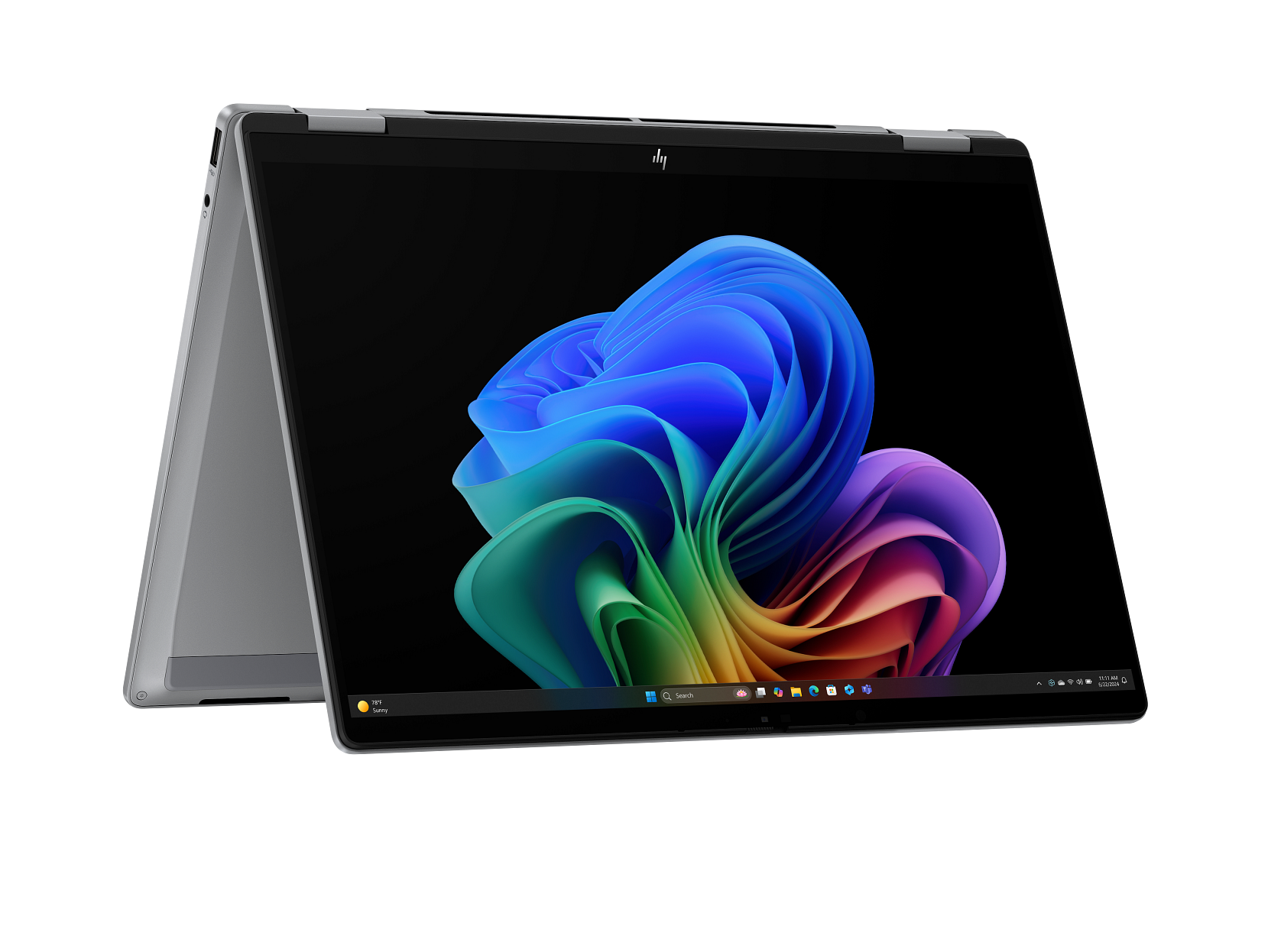 Ein silberner Laptop mit einem bunten, wirbelnden Hintergrundbild auf dem Bildschirm.