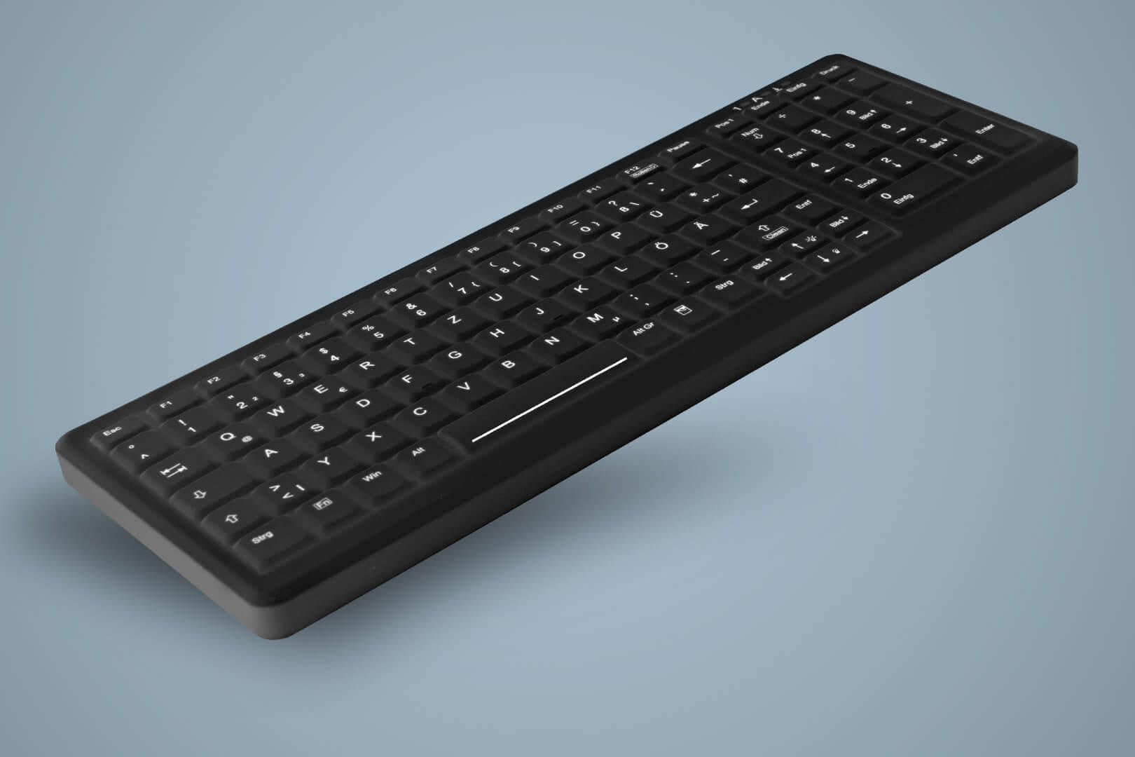 Un teclado negro con letras blancas sobre fondo azul.