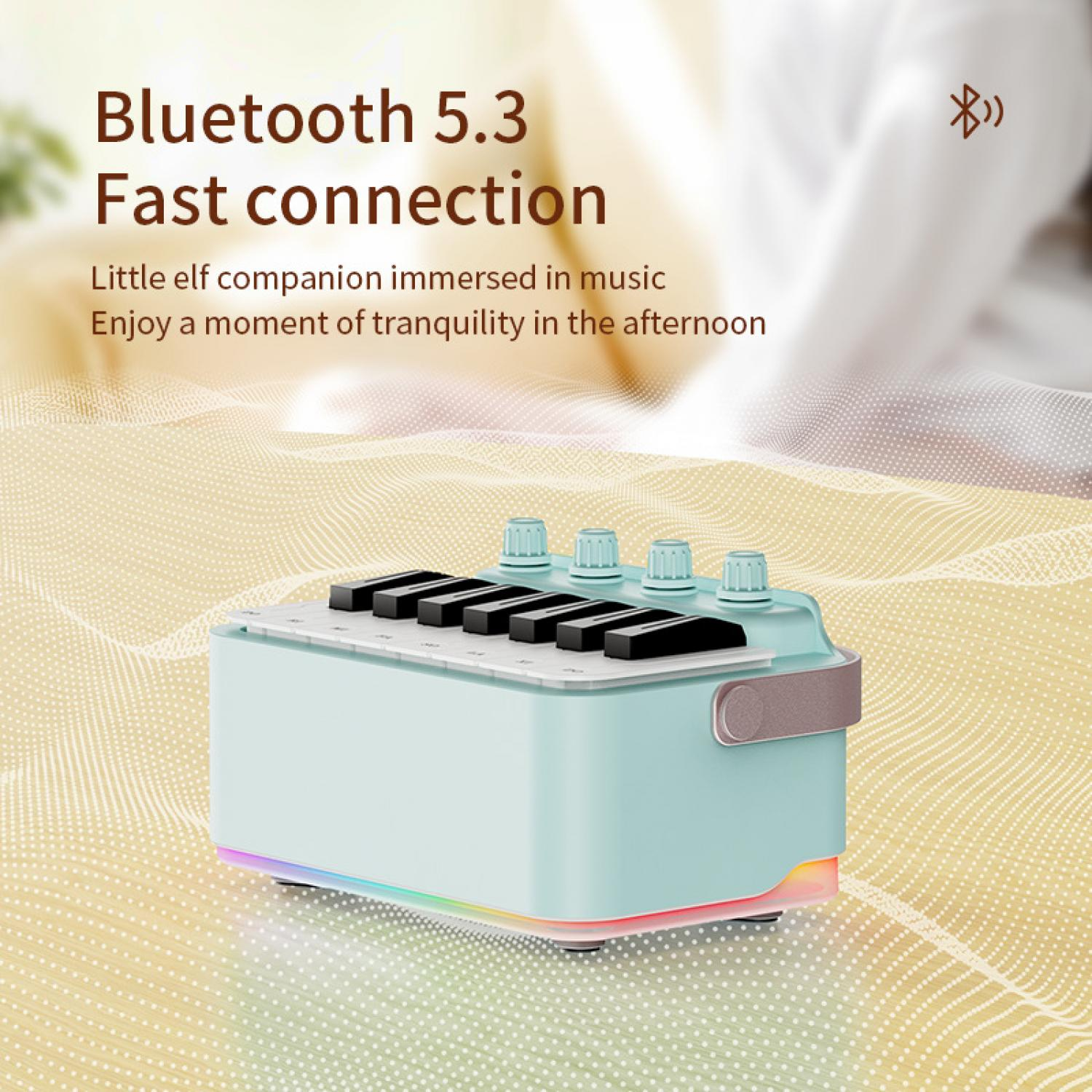 Ein türkisfarbener Mini-Synthesizer mit Tasten und Reglern, beleuchtet mit RGB-Lichtern.