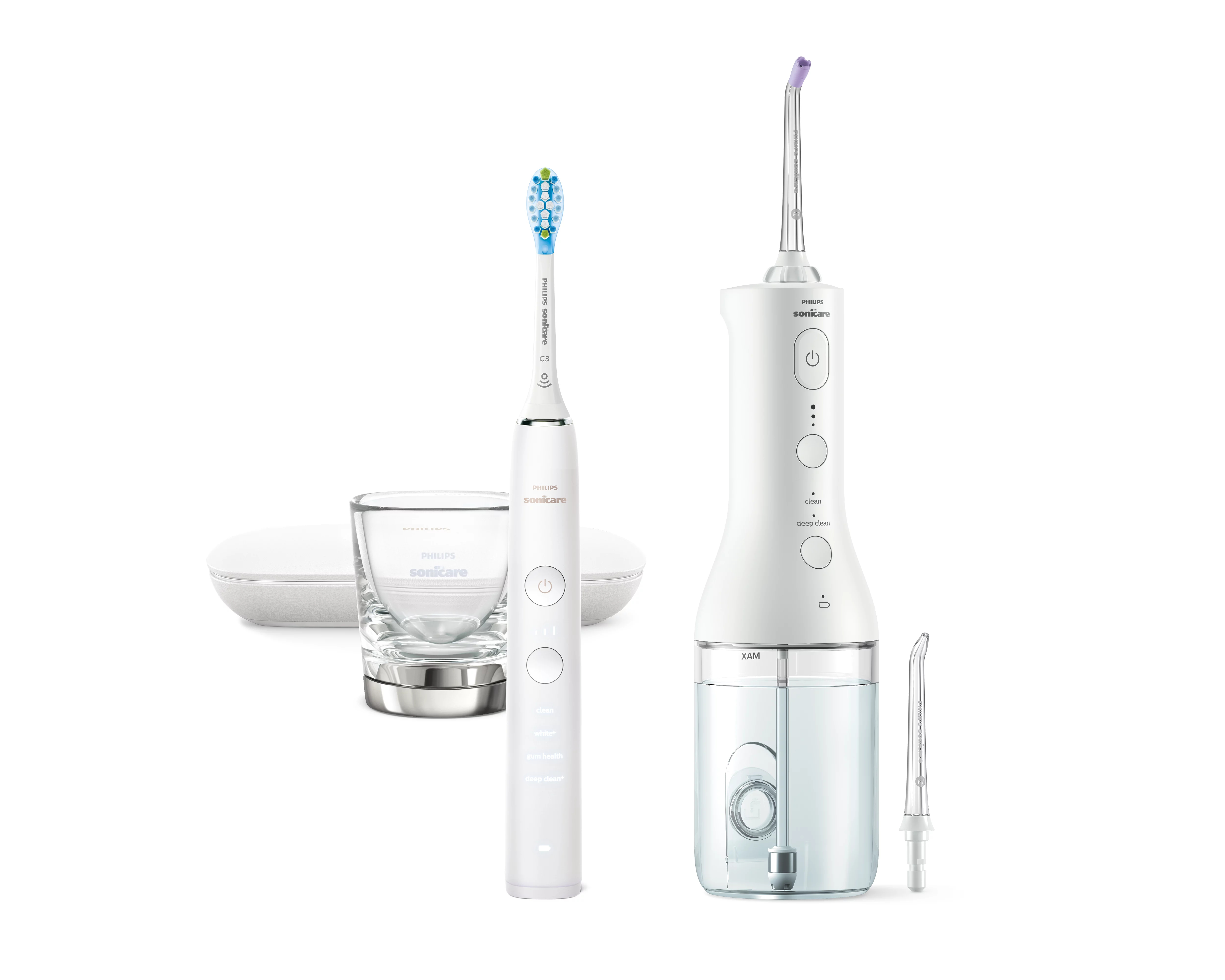 Weiße Philips Sonicare Zahnbürste, Munddusche, Glas und Ladestation.