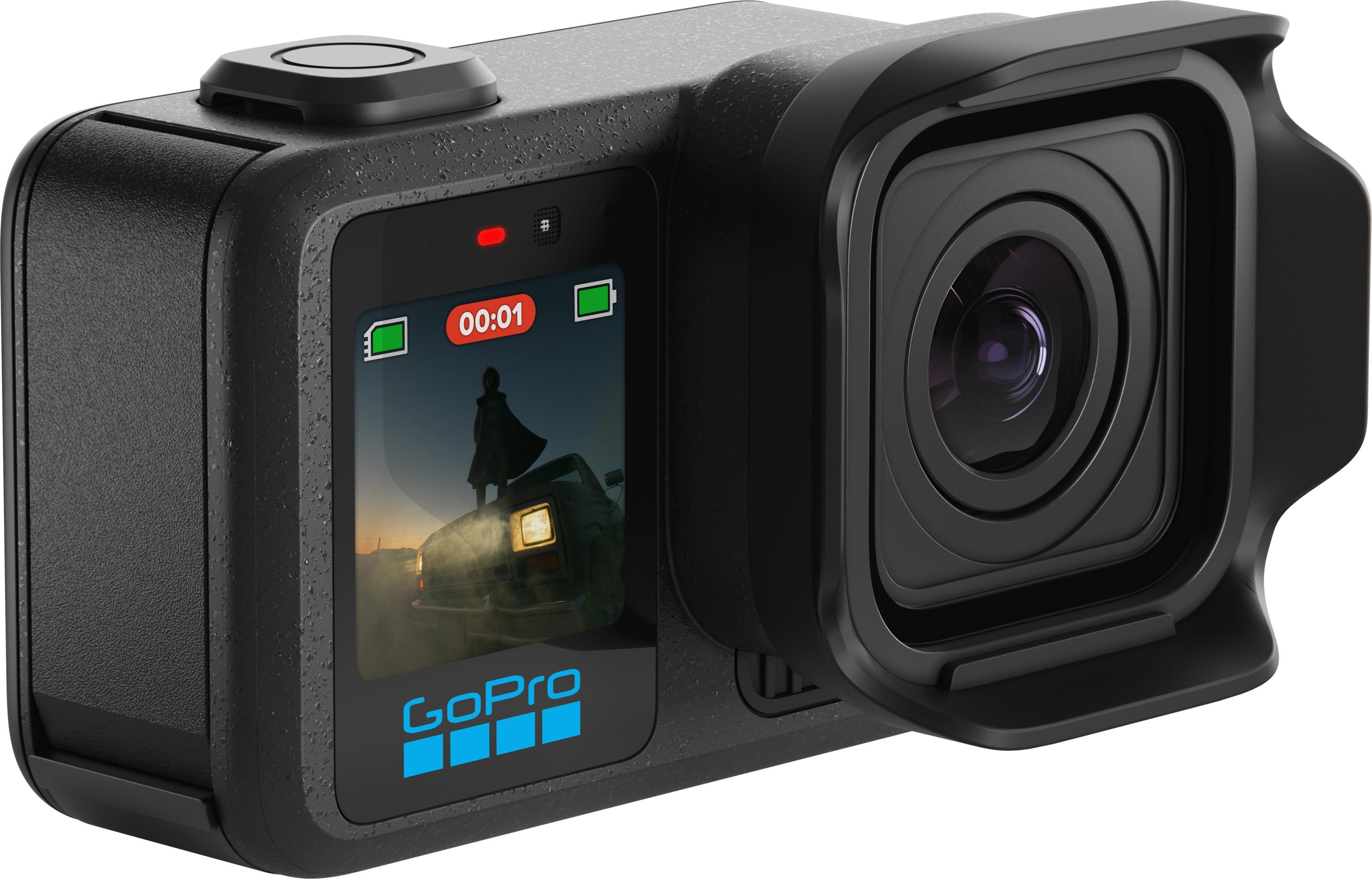 Cámara GoPro negra con escena de paisaje grabada en su pantalla.