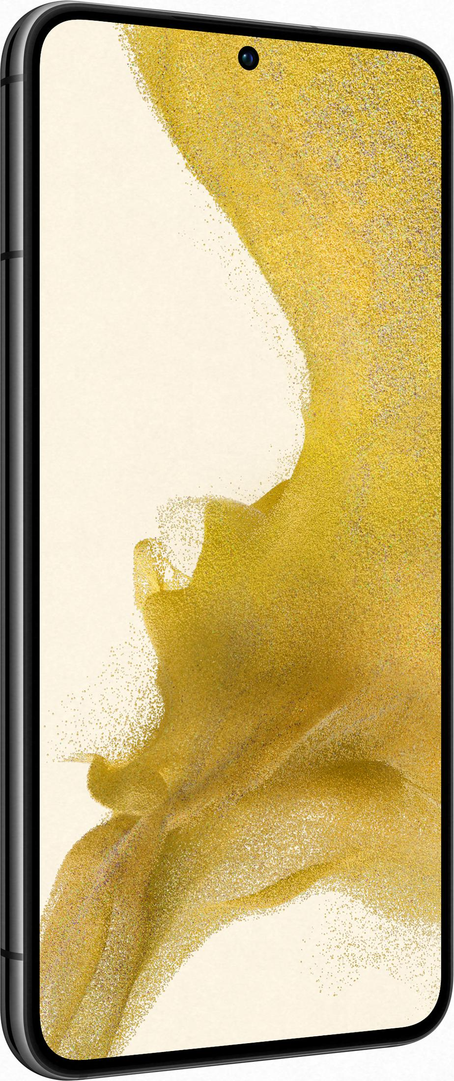 Ein Smartphone mit einem abstrakten goldfarbenen Muster auf hellem Hintergrund.