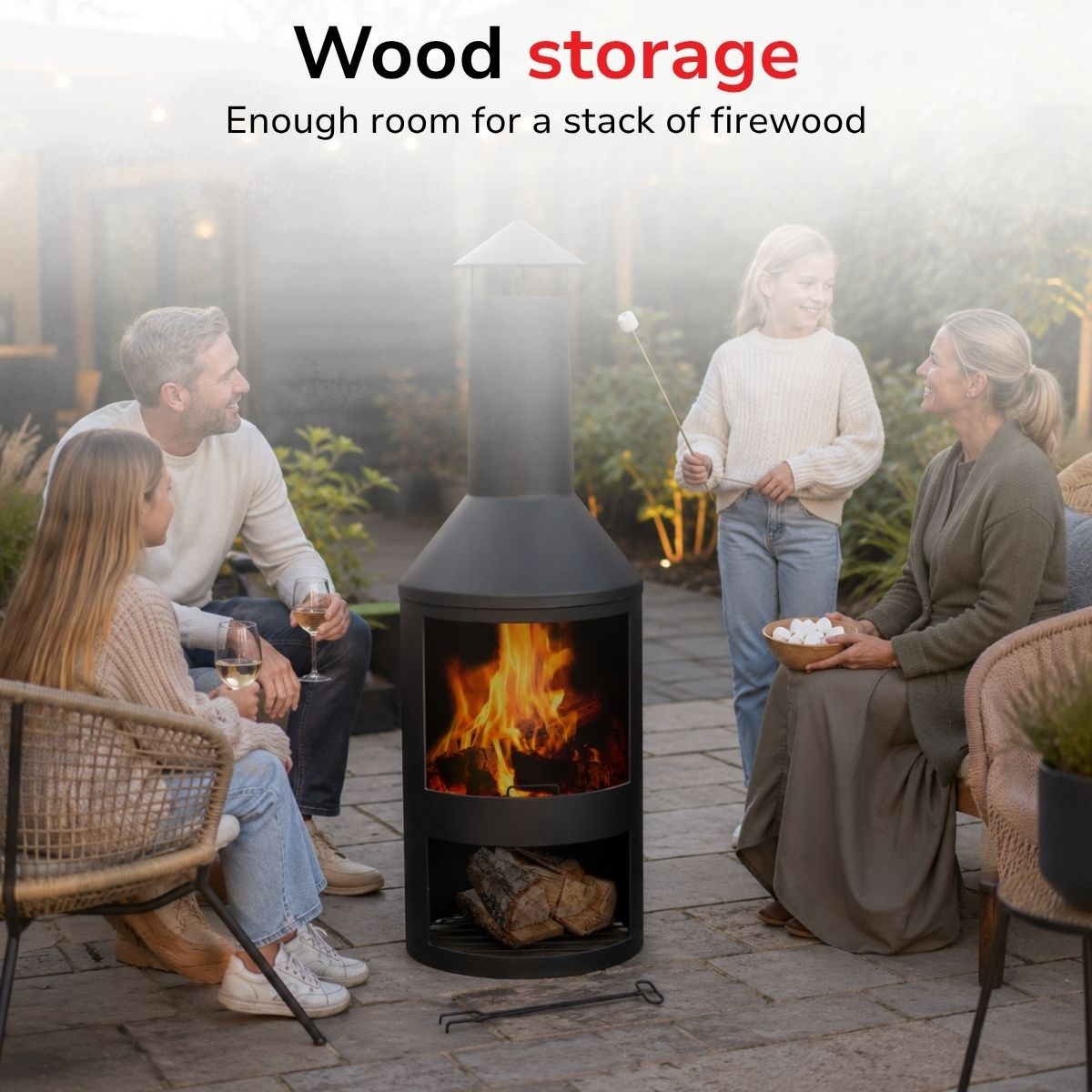 A family enjoys an evening by a fireplace, roasting marshmallows around a fire.