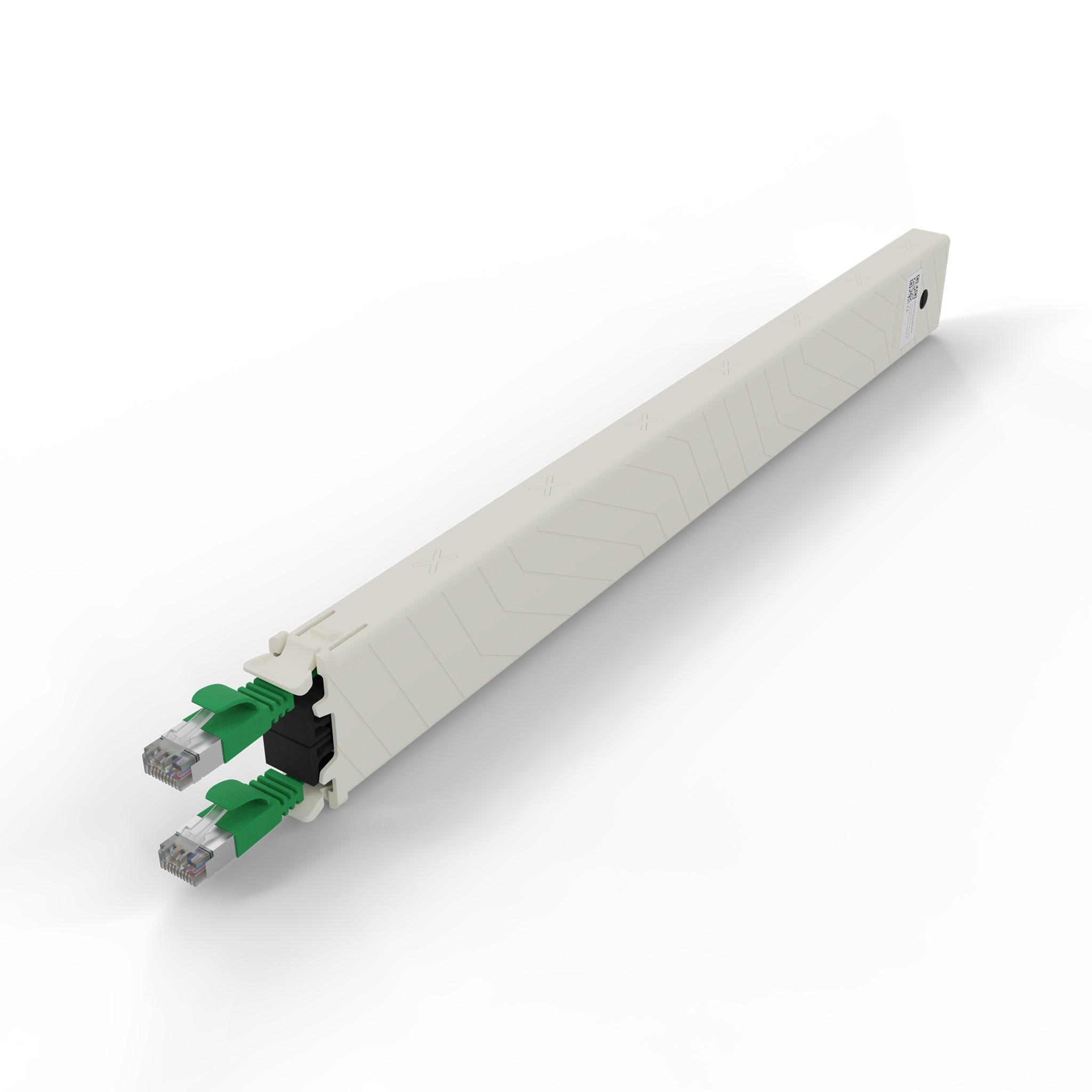 Un canalina per cavi beige con due cavi Ethernet verdi che ne escono.