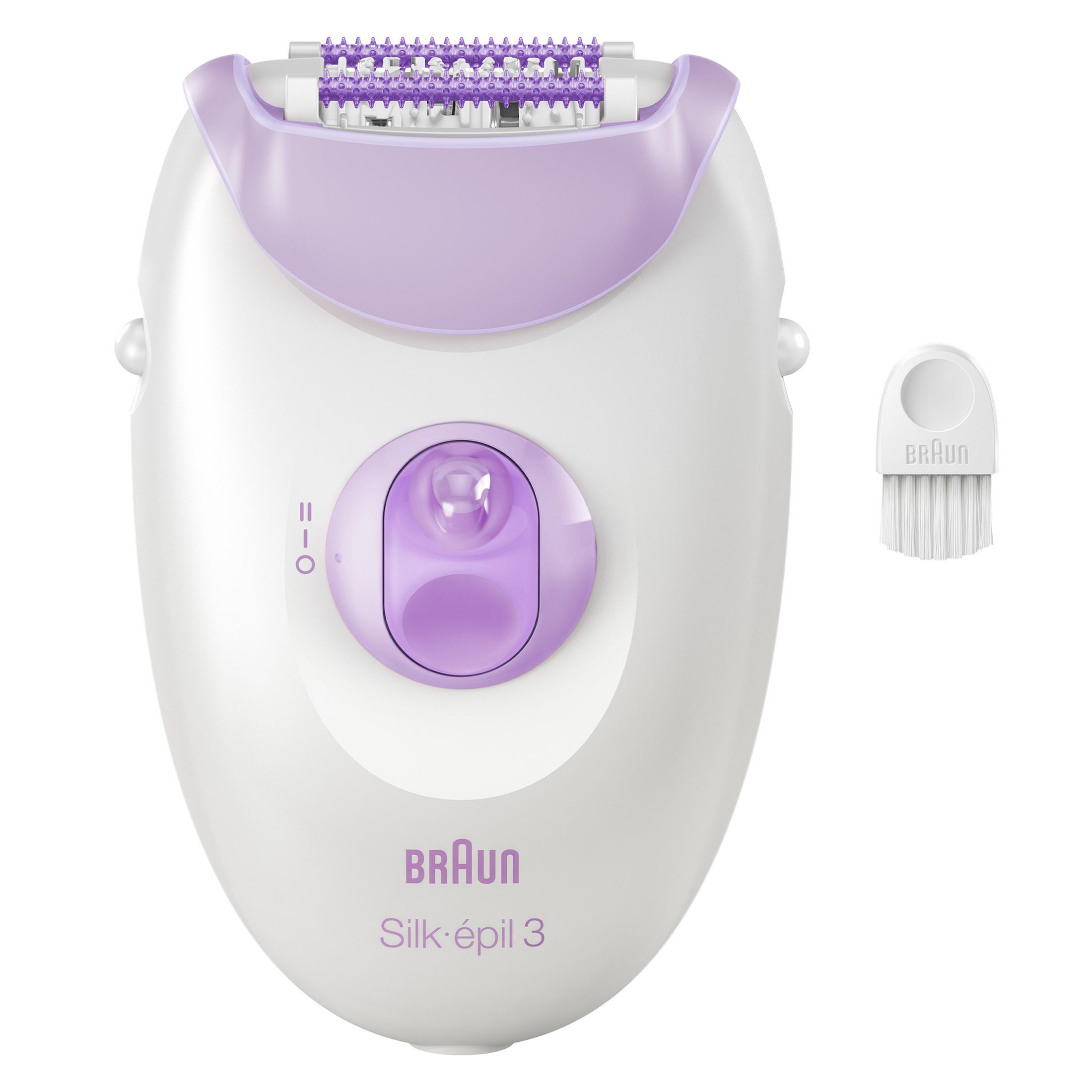 Un epilatore Braun bianco con accenti viola e accessori.