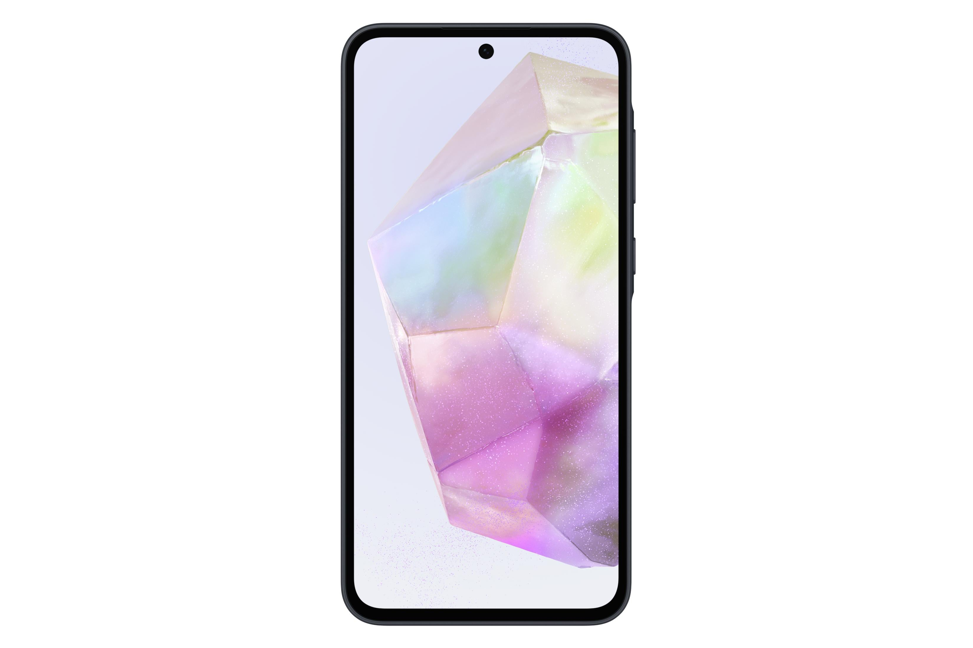 Smartfon wyświetlający kolorową tapetę z kryształem.