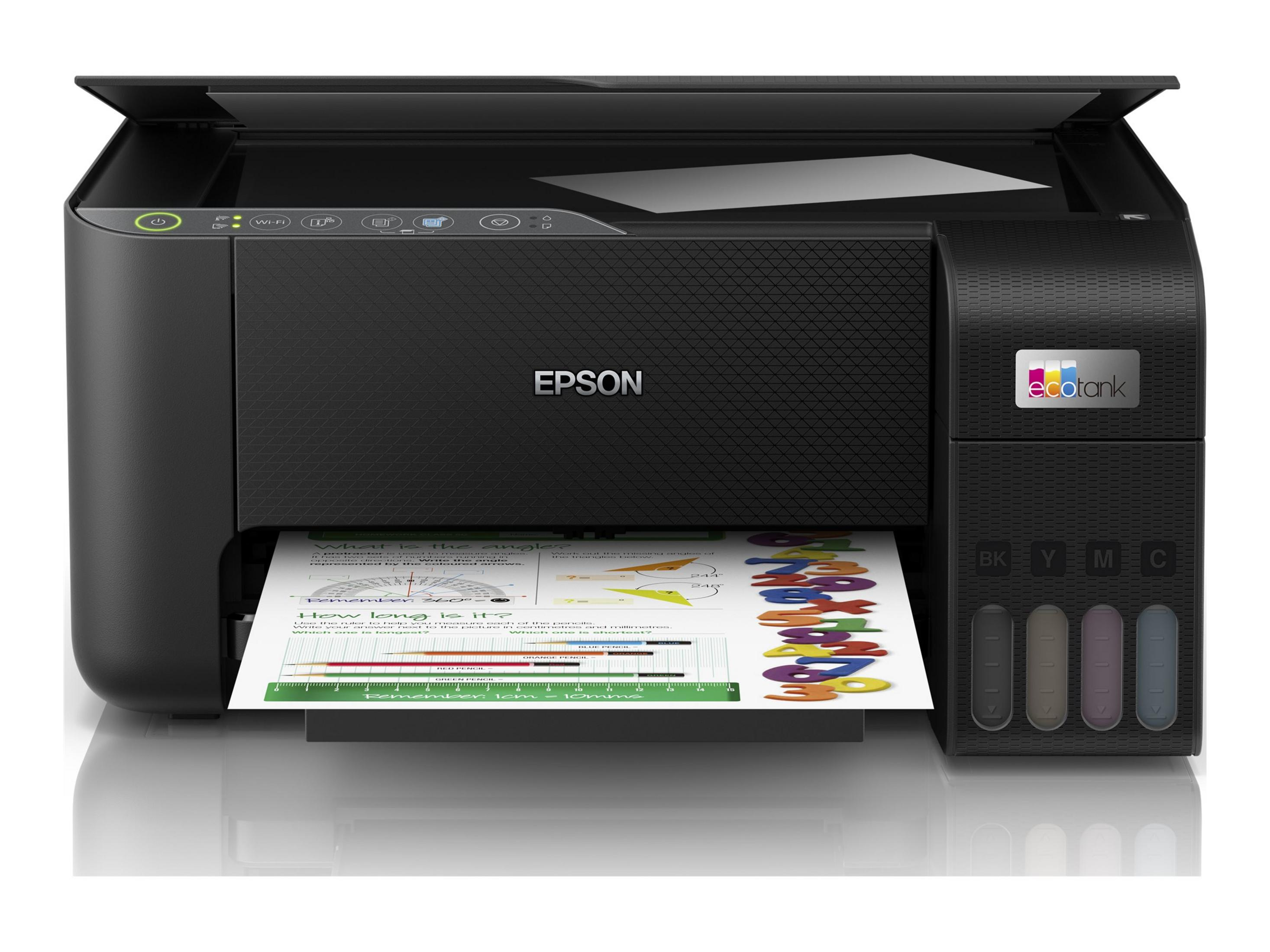 Czarna drukarka Epson EcoTank z otwartą pokrywą, pokazująca arkusz roboczy z liczbami i ołówkami.