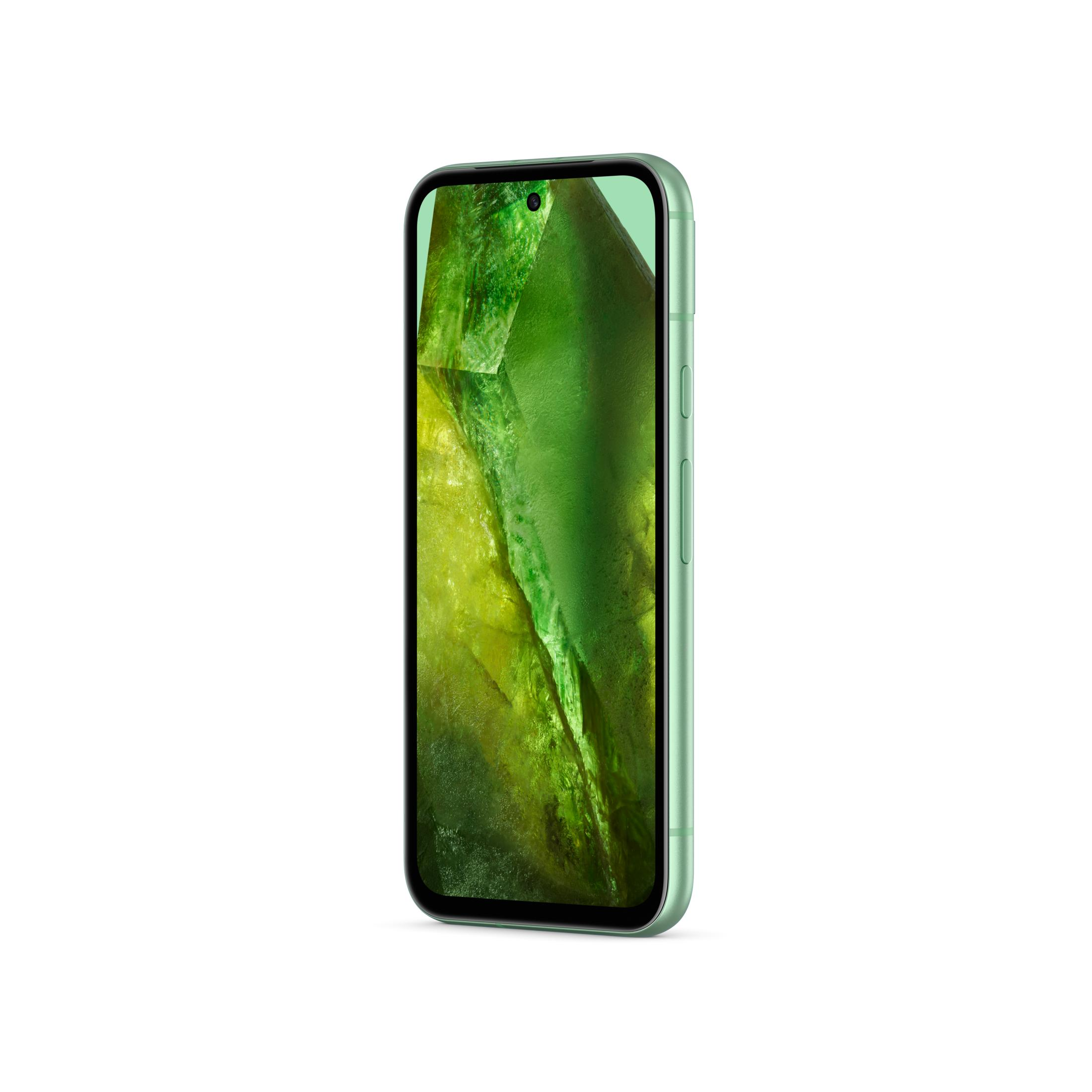 Jasnozielony smartfon z abstrakcyjną zieloną tapetą.