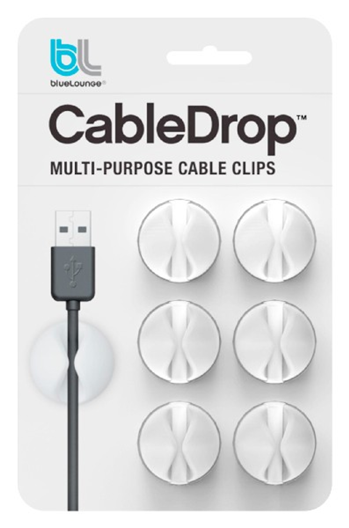 Verpackung mit Kabelclips: Ein USB-Kabelhalter und fünf weiße Clips.