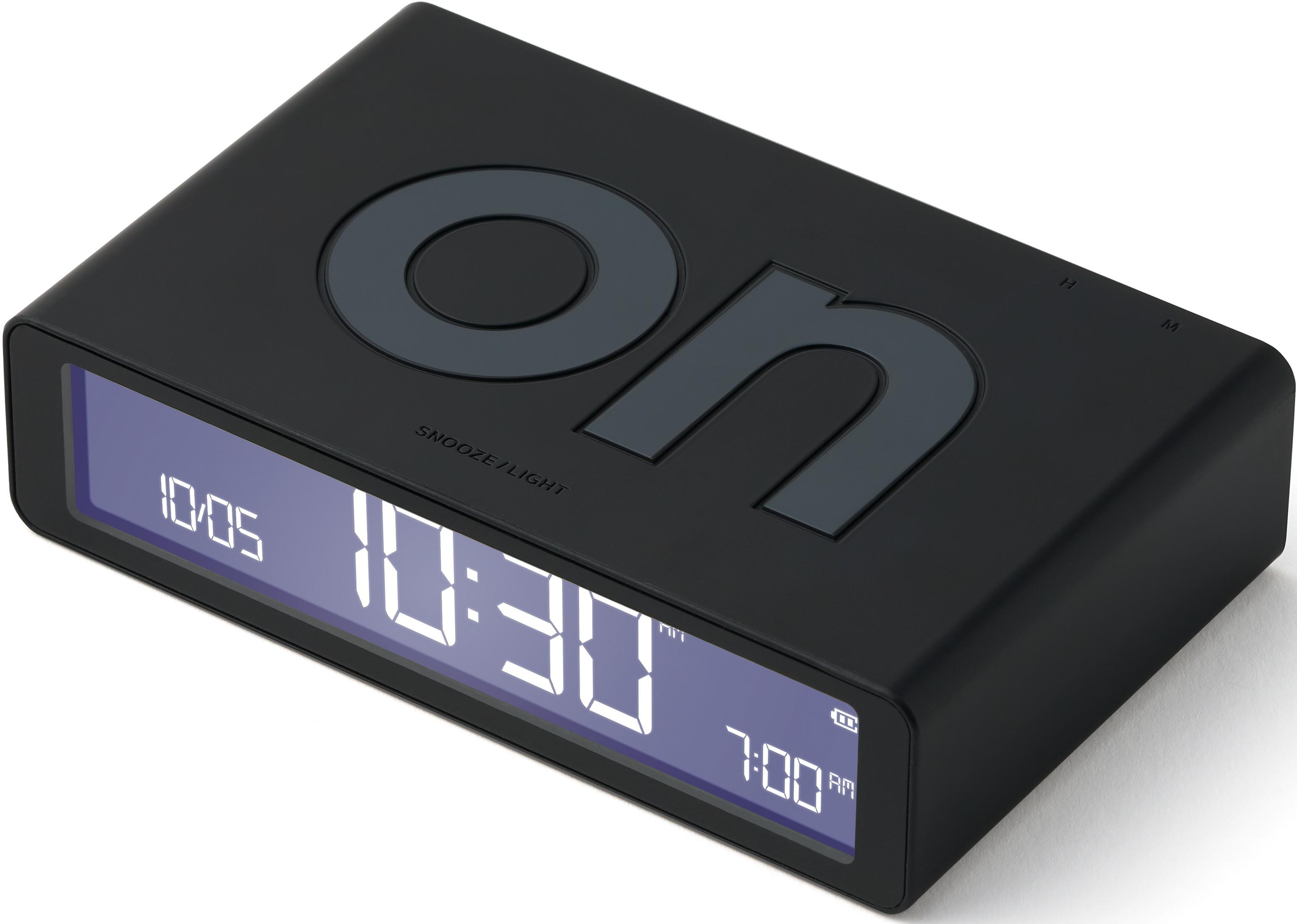 Sveglia digitale nera con display blu che mostra le 10:30 e le 7:00.
