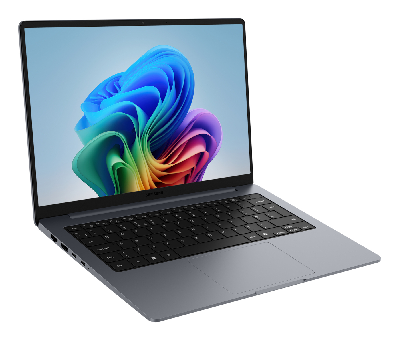 Un laptop Samsung grigio chiuso mostra uno sfondo astratto colorato sullo schermo.