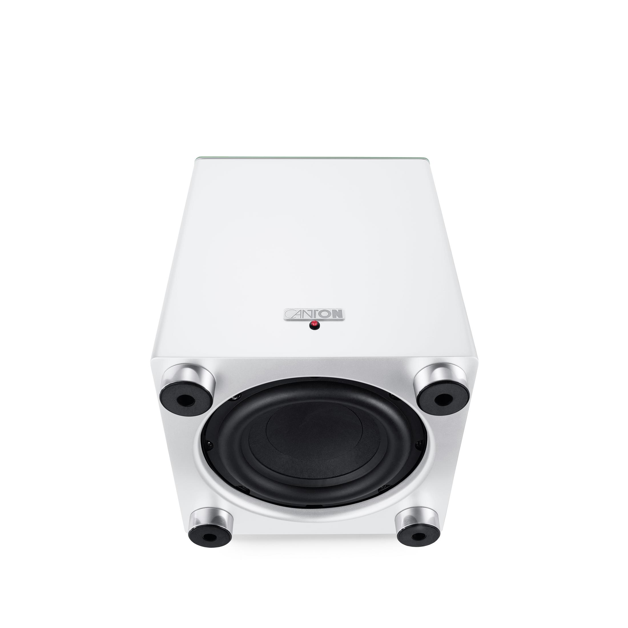 Ein weißer Subwoofer mit einem schwarzen Lautsprecher und silbernen Füßen.