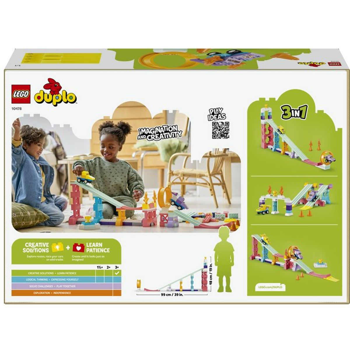 Bambini giocano con set pista palline LEGO Duplo sul pavimento.