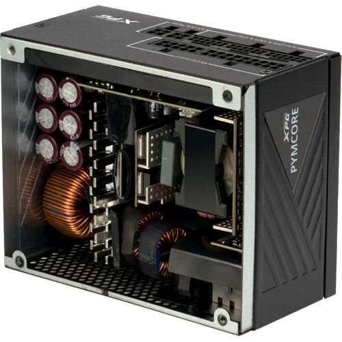 Un alimentatore per computer aperto che mostra condensatori, bobine e una ventola.