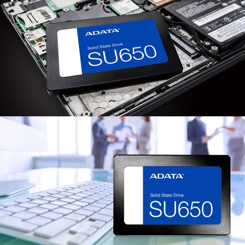 SSD ADATA SU650 in un laptop e su una scrivania con tastiera.