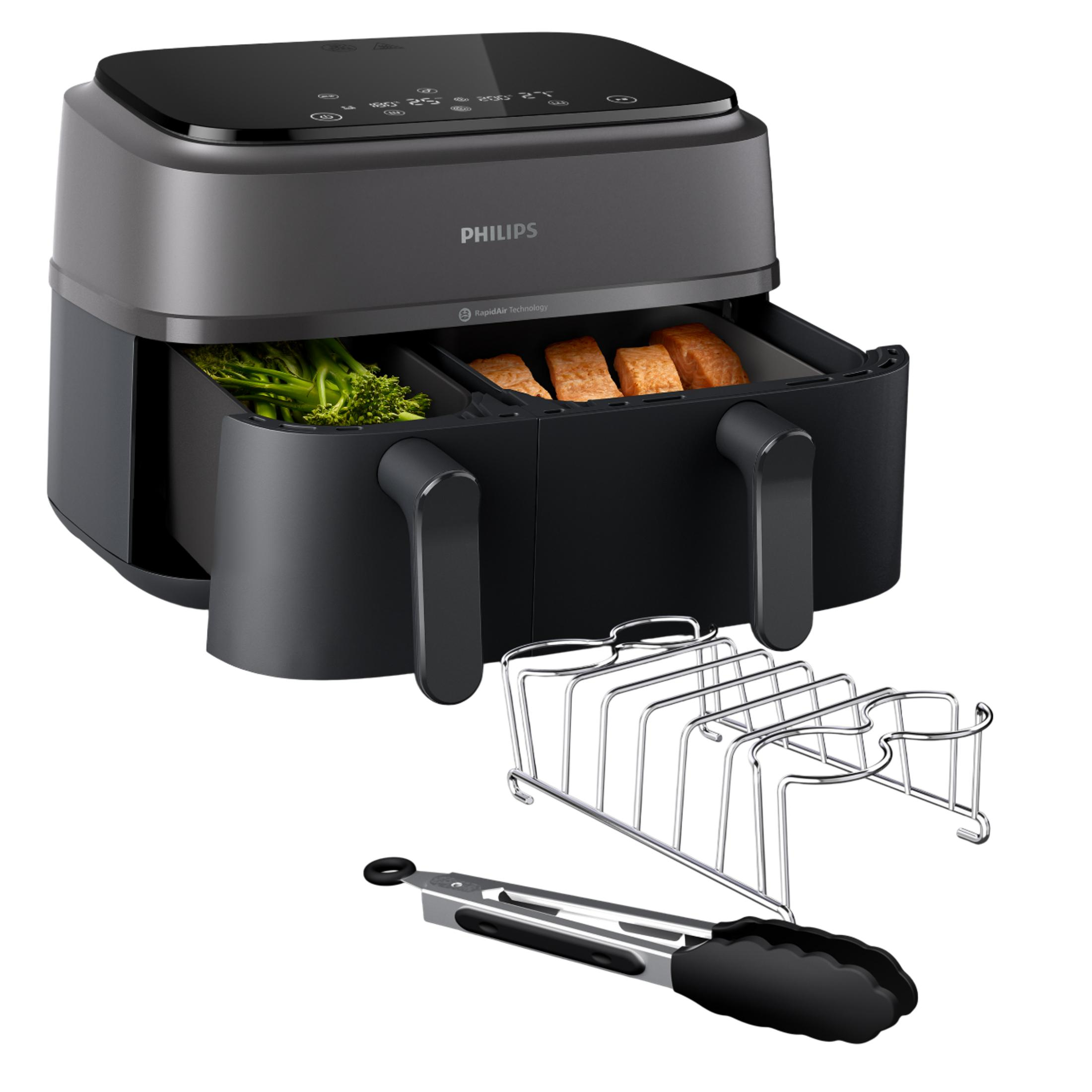 Una freidora de aire Philips con dos cajones, llenos de brócoli y salmón.