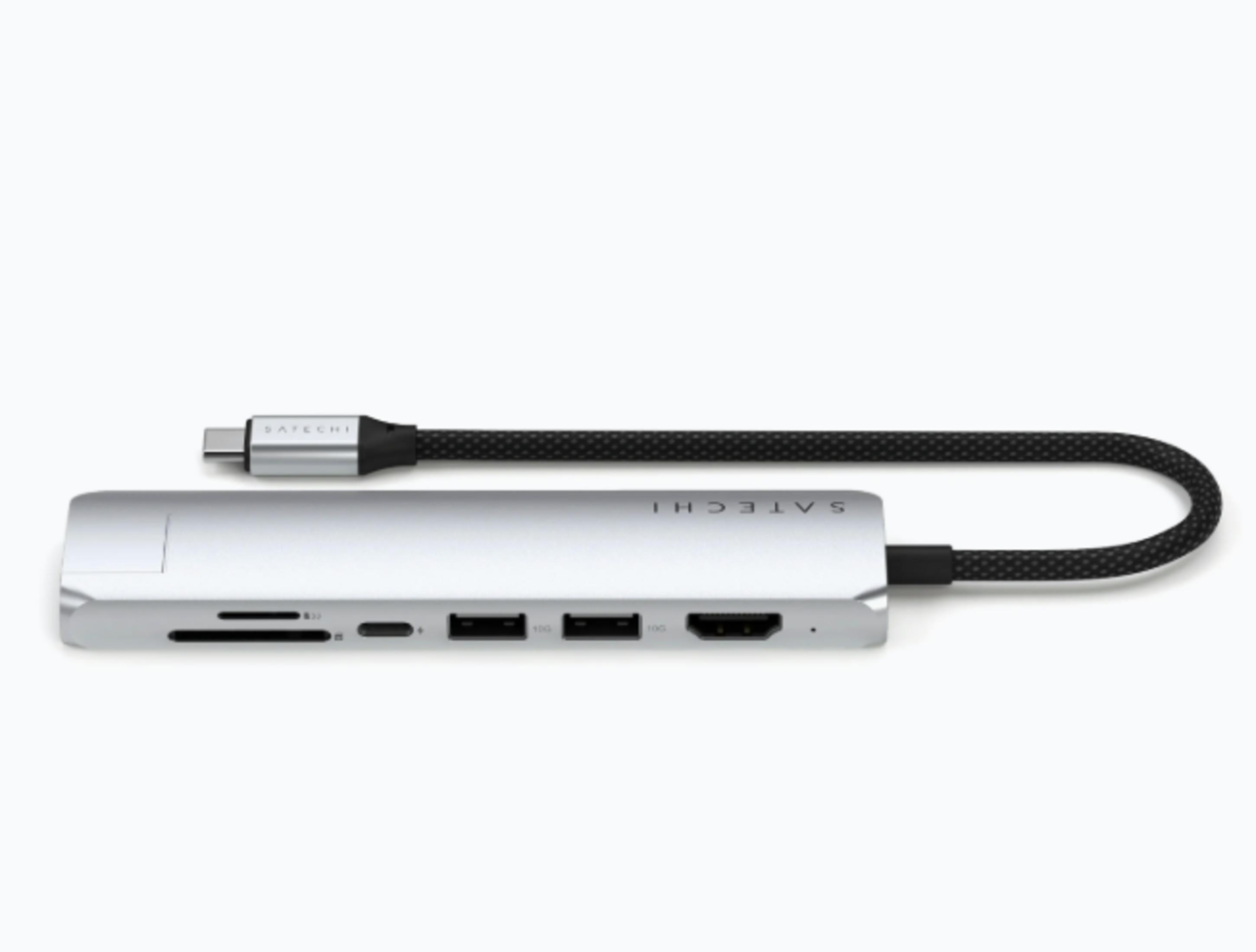 Silberner USB-C-Hub mit SD-Kartensteckplatz, USB-Anschlüssen und HDMI.