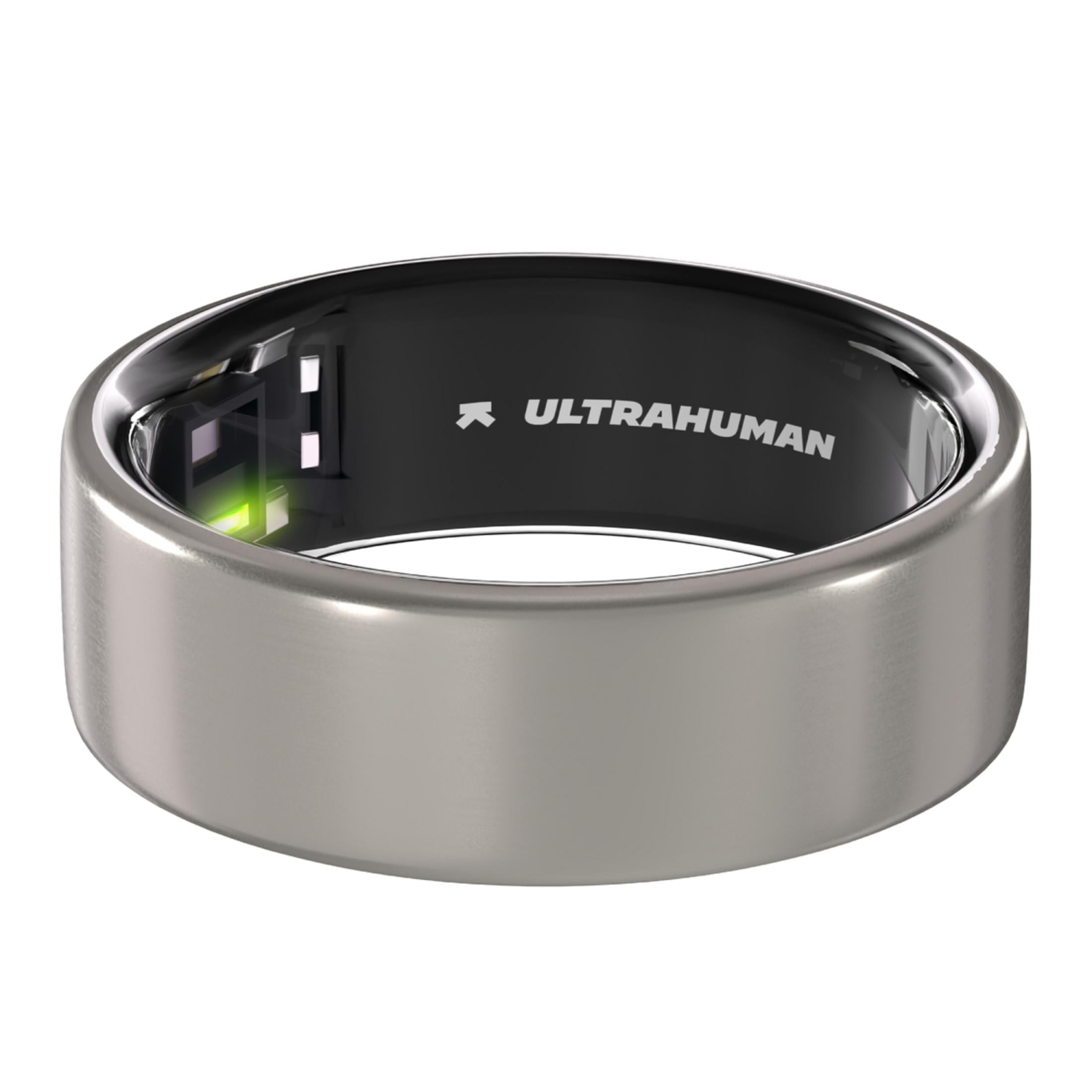 Ein silberner Ring mit schwarzer Innenseite und "ULTRAHUMAN"-Logo. Ein grünes Licht leuchtet.