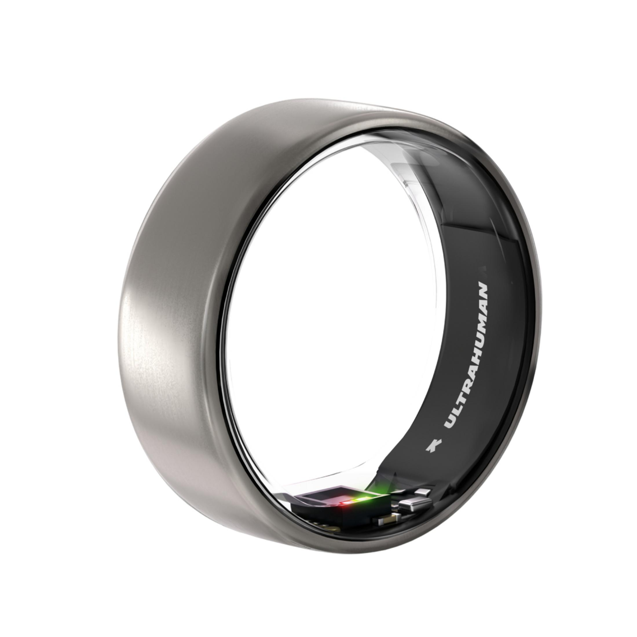 Ein glänzender Ring mit inneren elektronischen Komponenten und grünen und roten Lichtern.