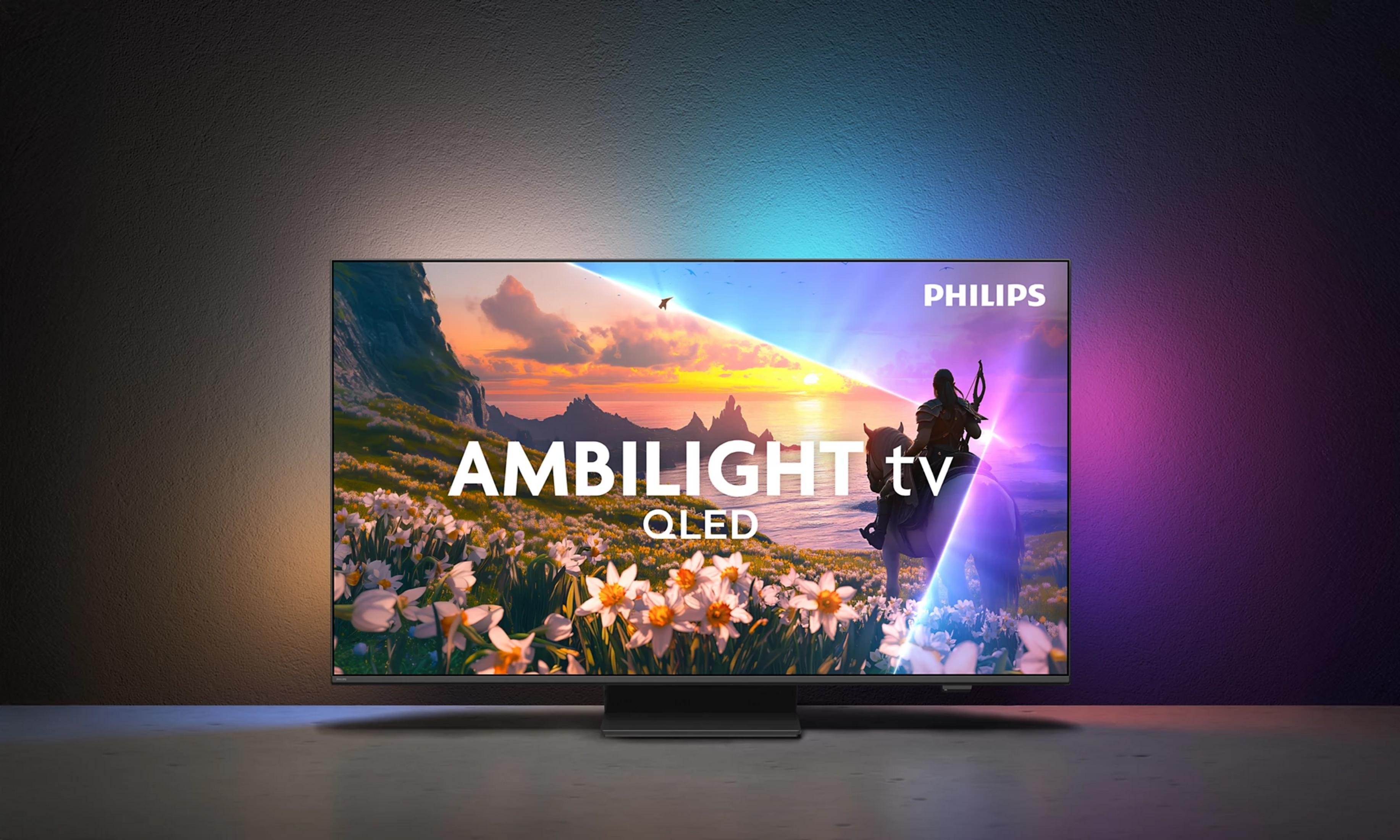 Un TV Philips Ambilight mostra un paesaggio fantasy con fiori e un cavaliere a cavallo.