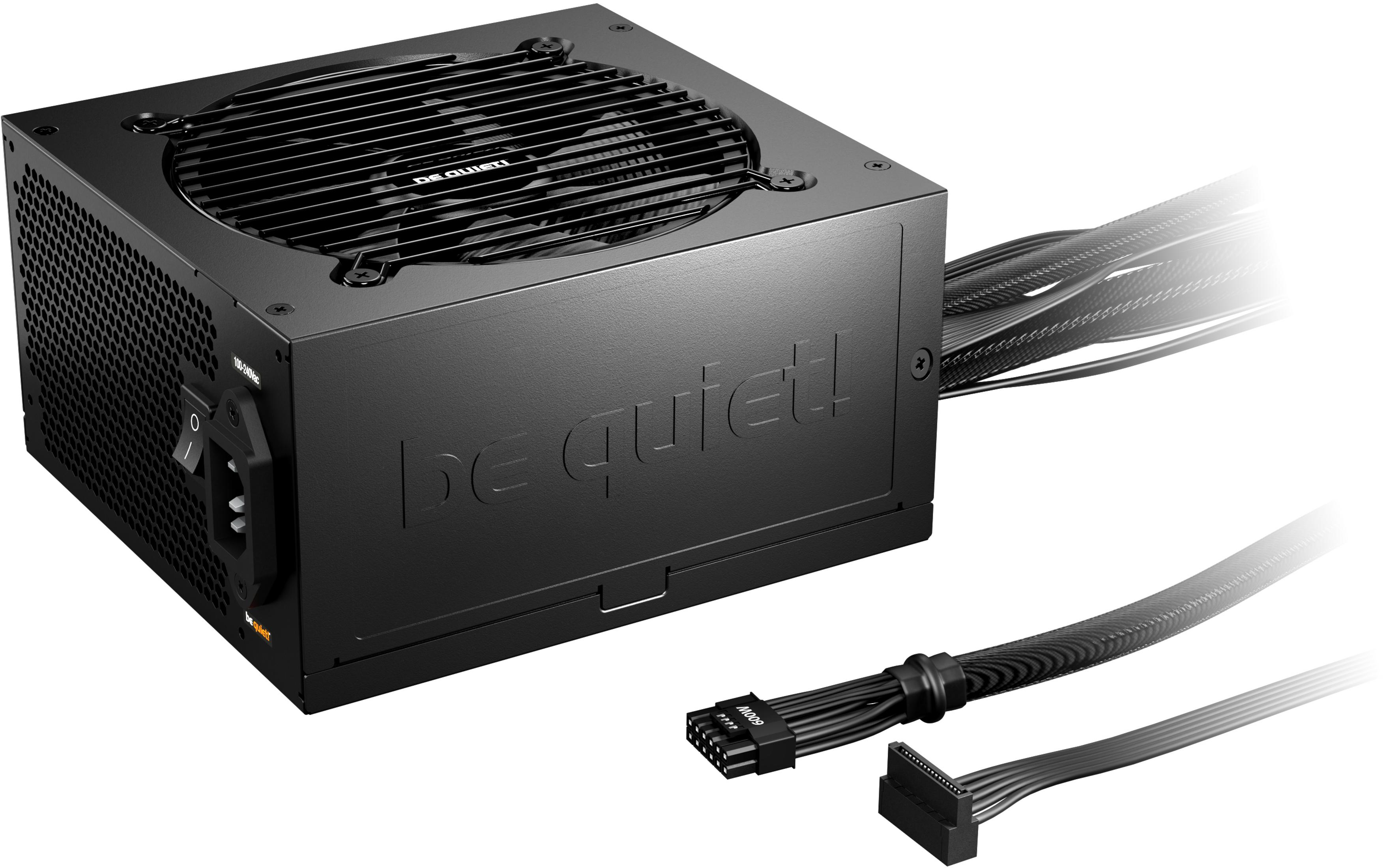 Bloc d'alimentation noir avec grille de ventilateur, interrupteur et câbles.