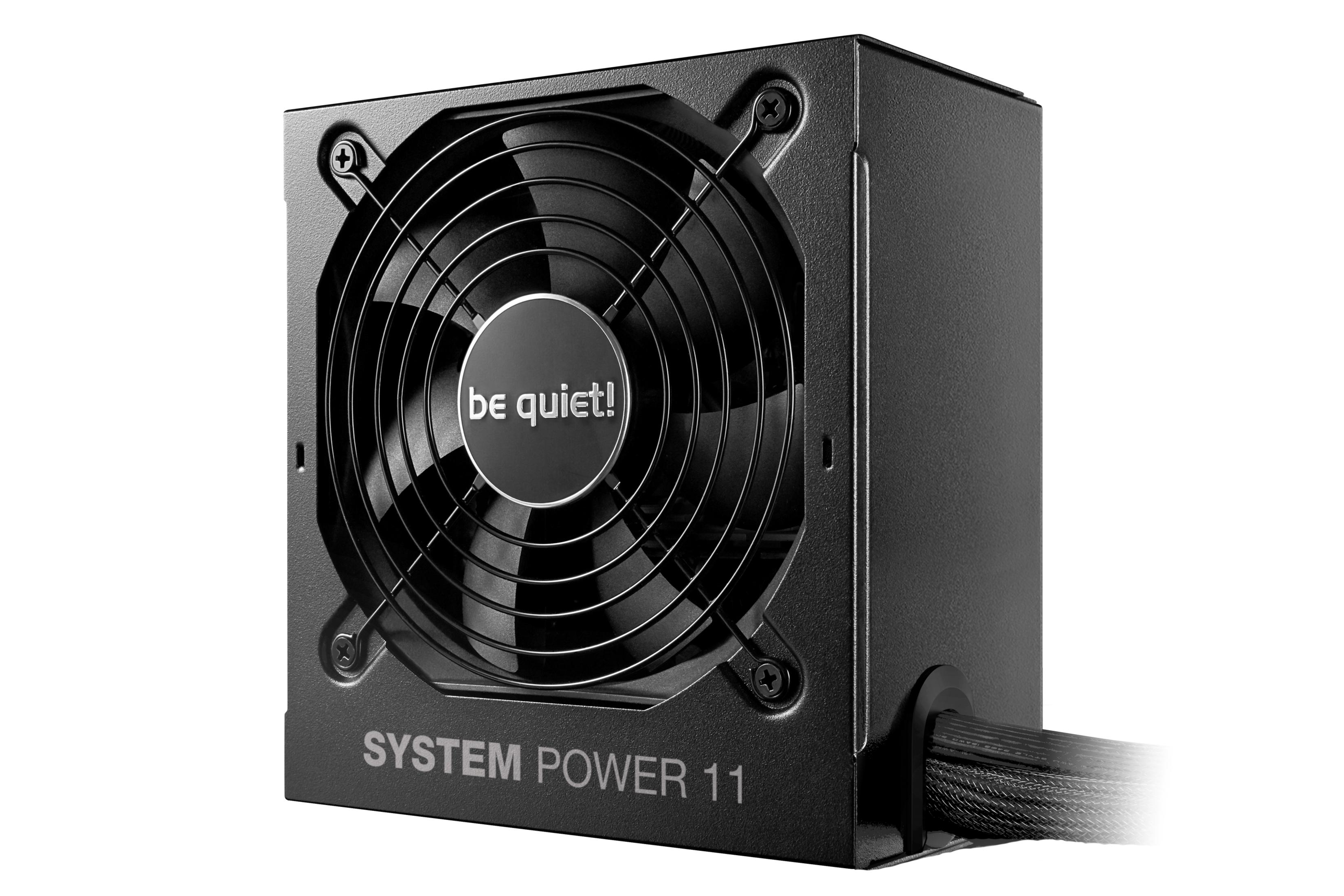 Schwarzes Netzteil mit Lüfter und "be quiet!"-Logo. Beschriftung "SYSTEM POWER 11".