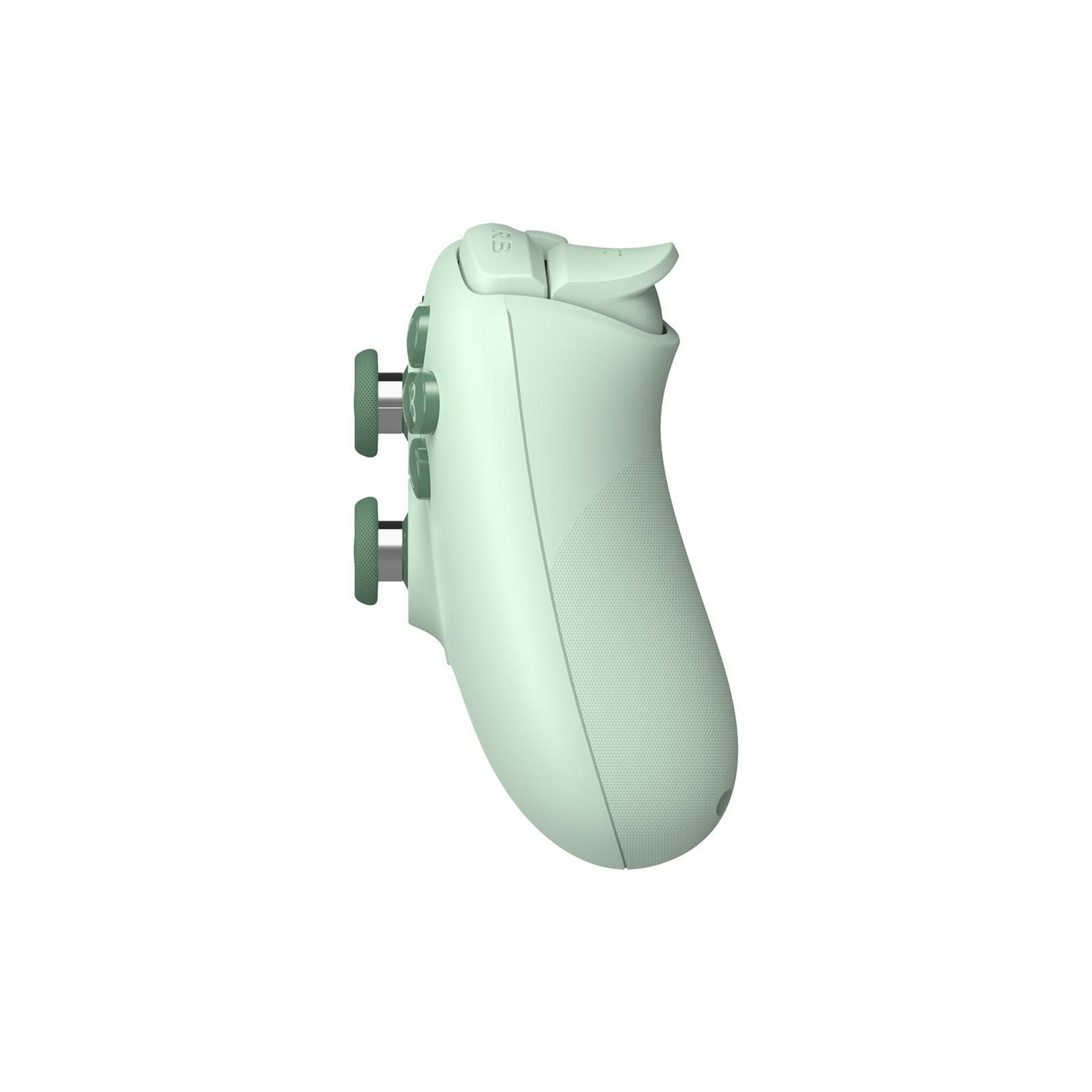 Un controller verde chiaro con pulsanti e D-pad.