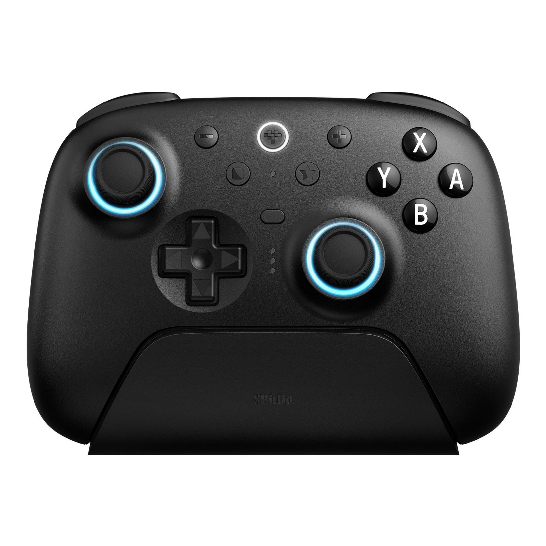 Ein schwarzer Gamecontroller mit leuchtend blauen Ringen um die Joysticks und einem weißen Mittelknopf.