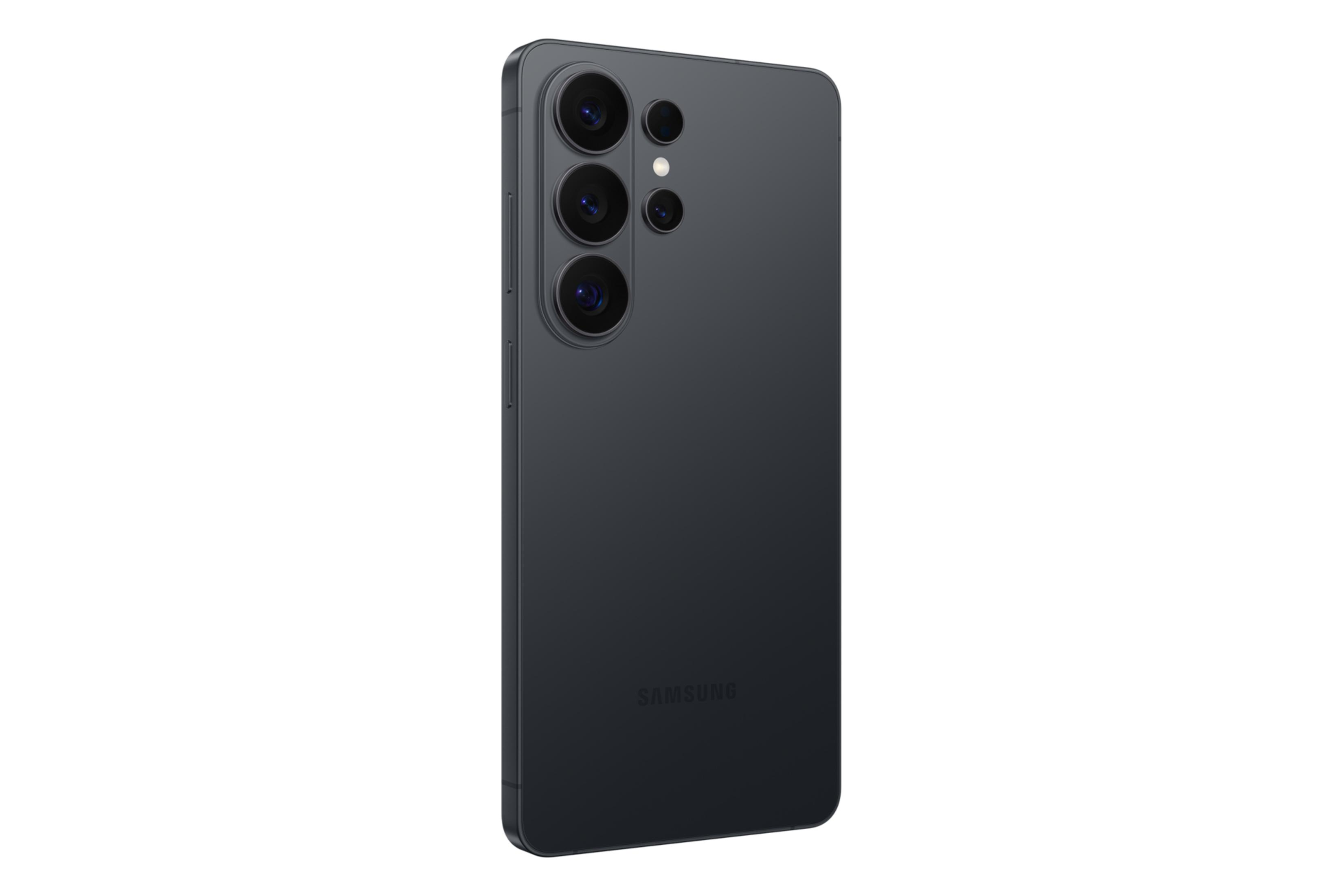 Ciemnoszary smartfon z czterema obiektywami aparatu z tyłu.