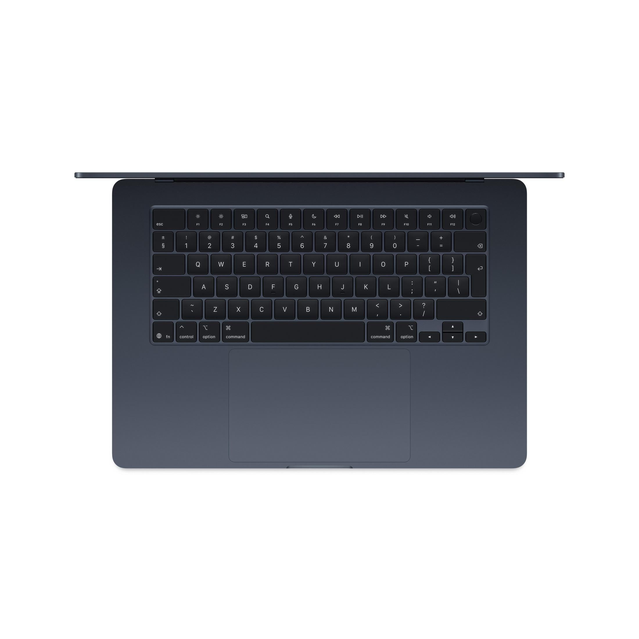 Ein dunkles, geschlossenes MacBook mit Tastatur und Trackpad.