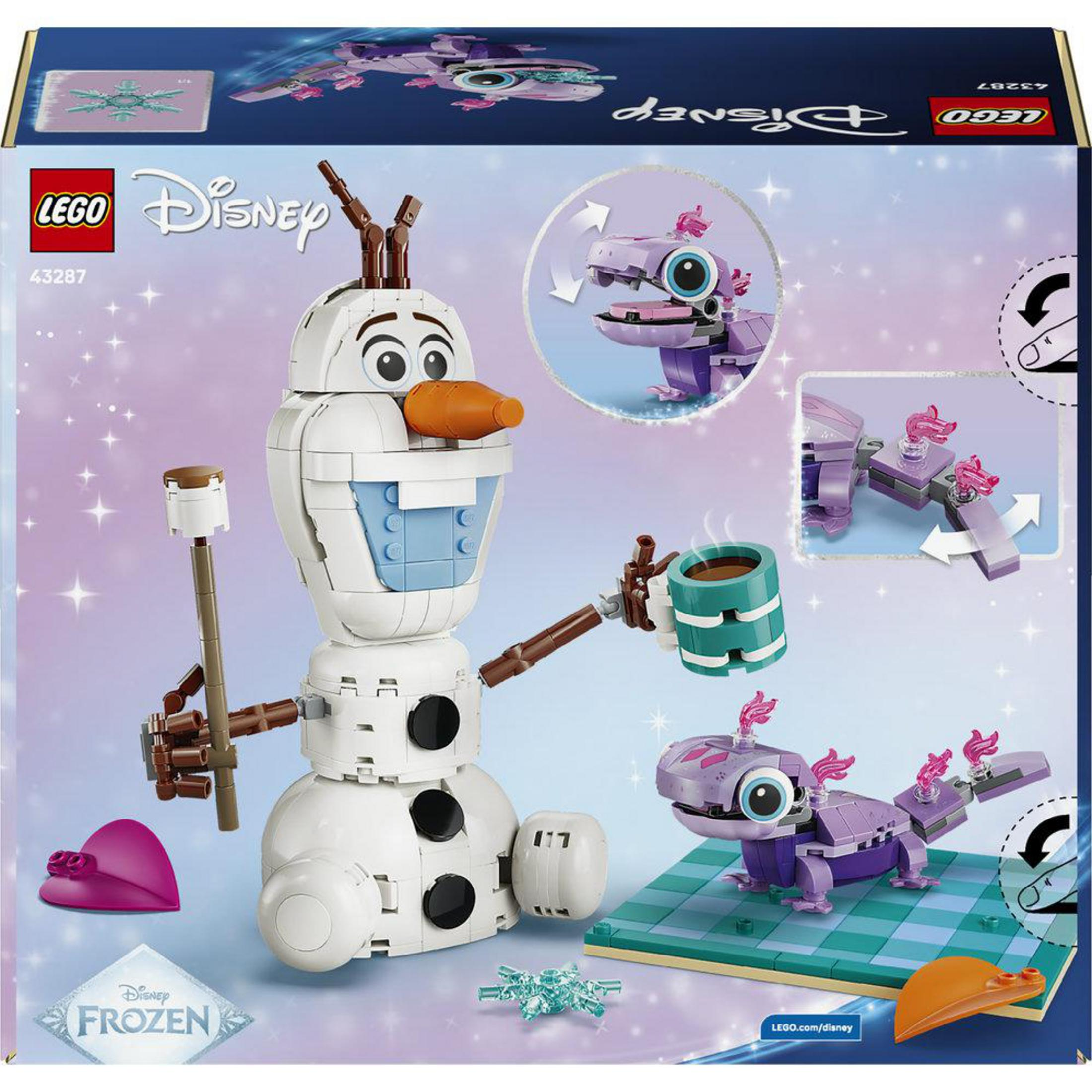 Olaf de LEGO de Disney's Frozen sostiene una taza de bebida caliente. A su lado hay una criatura morada tipo salamandra.
