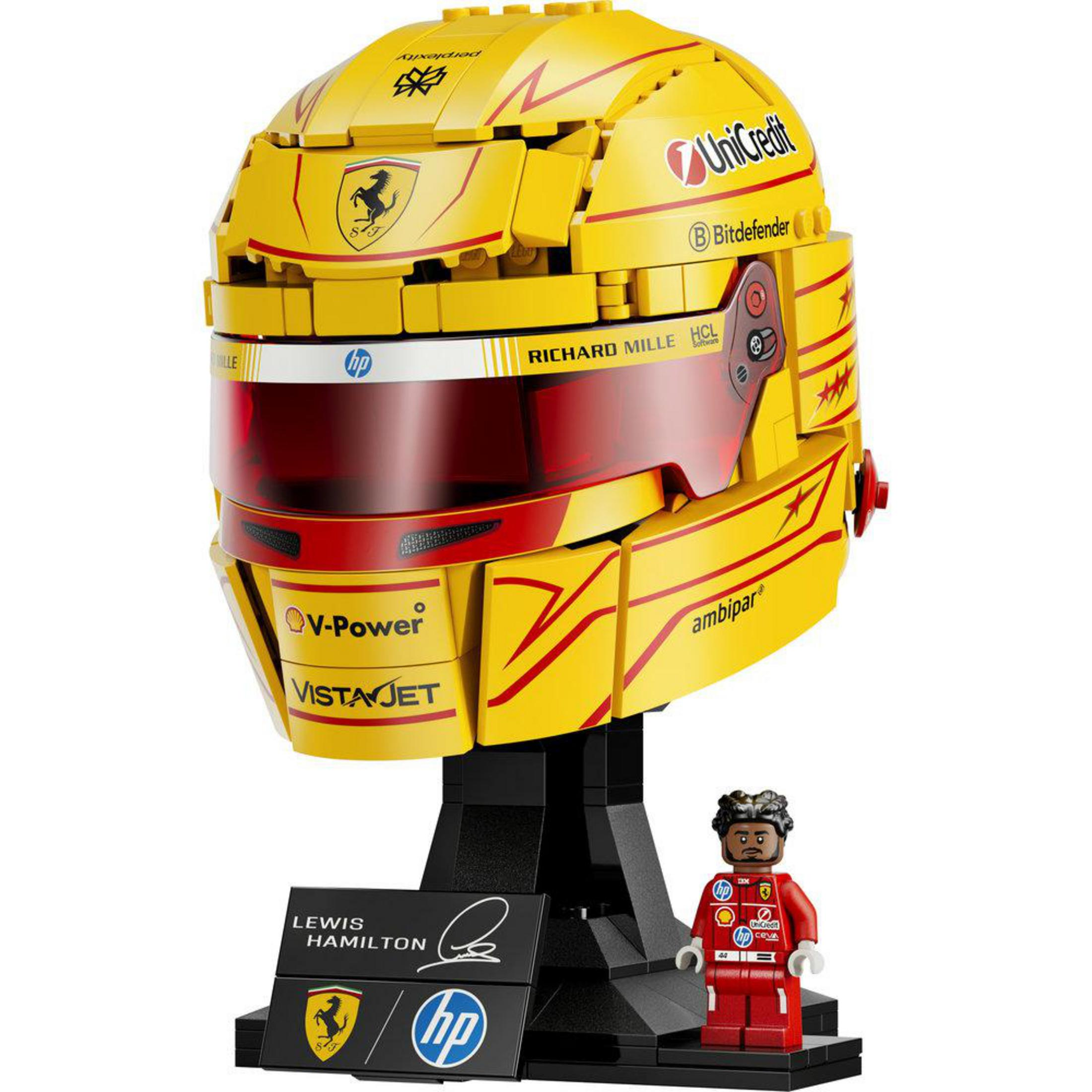 Un casco Lego giallo con visiera rossa, e una piccola figura accanto.