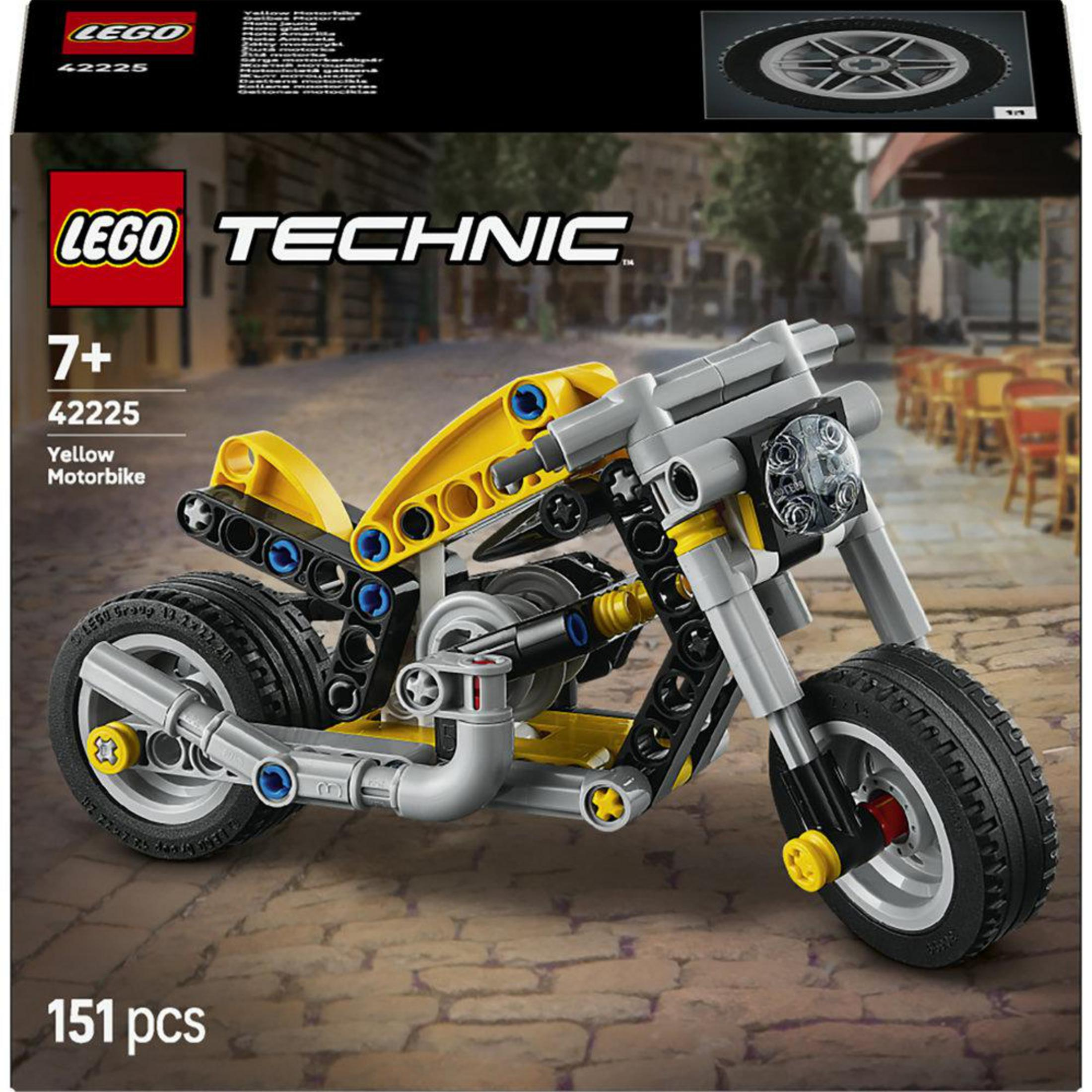 Set de construcción de moto amarilla LEGO Technic con 151 piezas sobre fondo de adoquines.