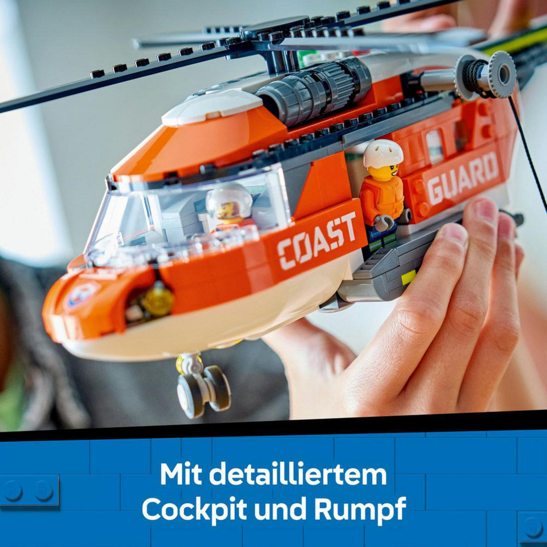Szczegółowy model helikoptera ratowniczego Lego w kolorze pomarańczowym i białym trzymany przez ręce.