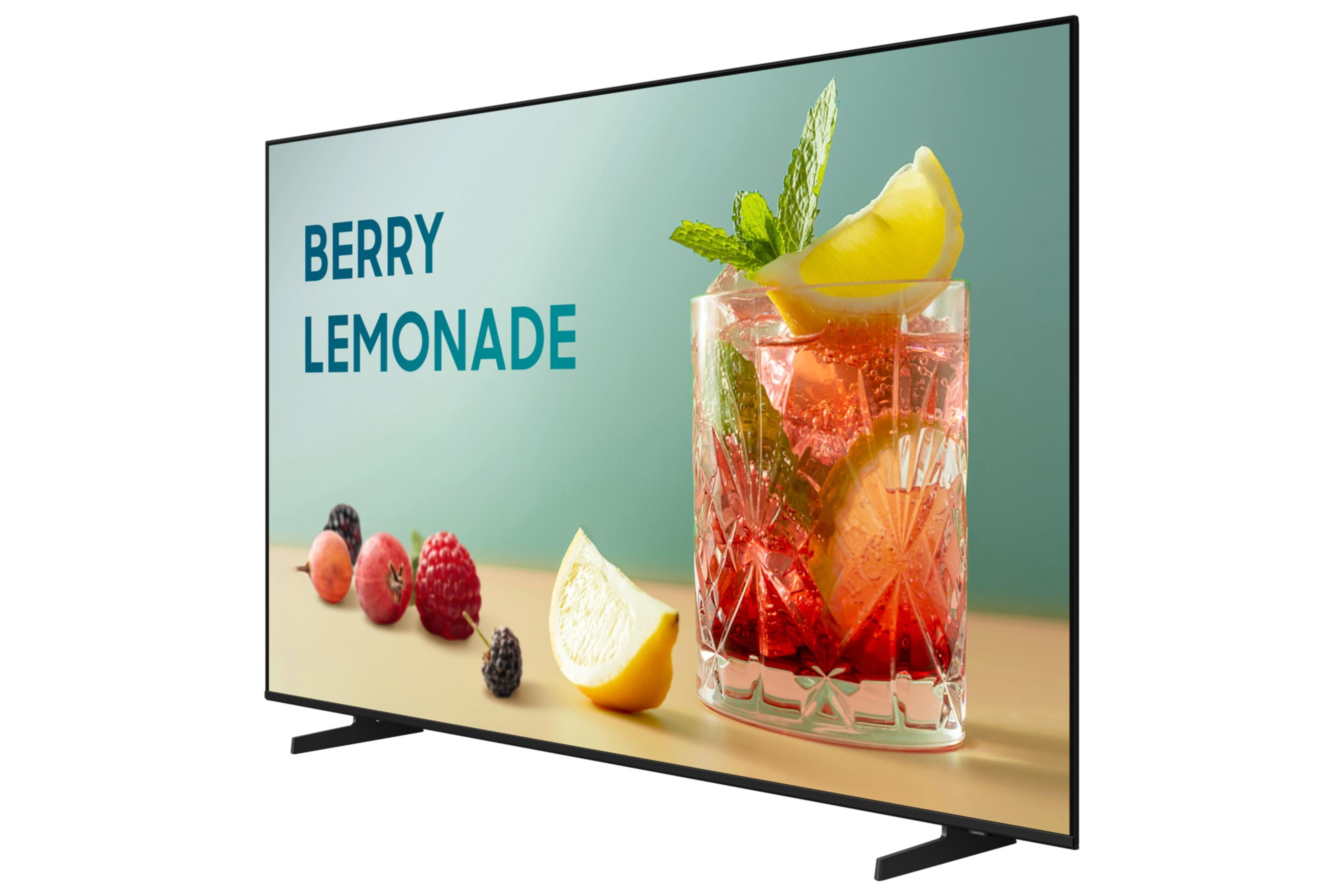 A glass of berry lemonade with berries and lemon next to text on a screen.